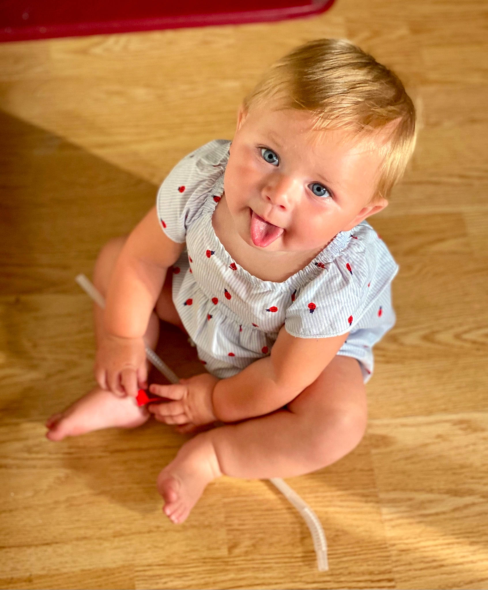 Sawyer joined the competition — help win amazing prizes! baby, baby_toddler_clothing, barefoot, cheek, chin, floor, flooring, foot, happy, hardwood, human_leg, knee, laminate_flooring, person, skin, sleeve, smile, thigh, toddler, wood