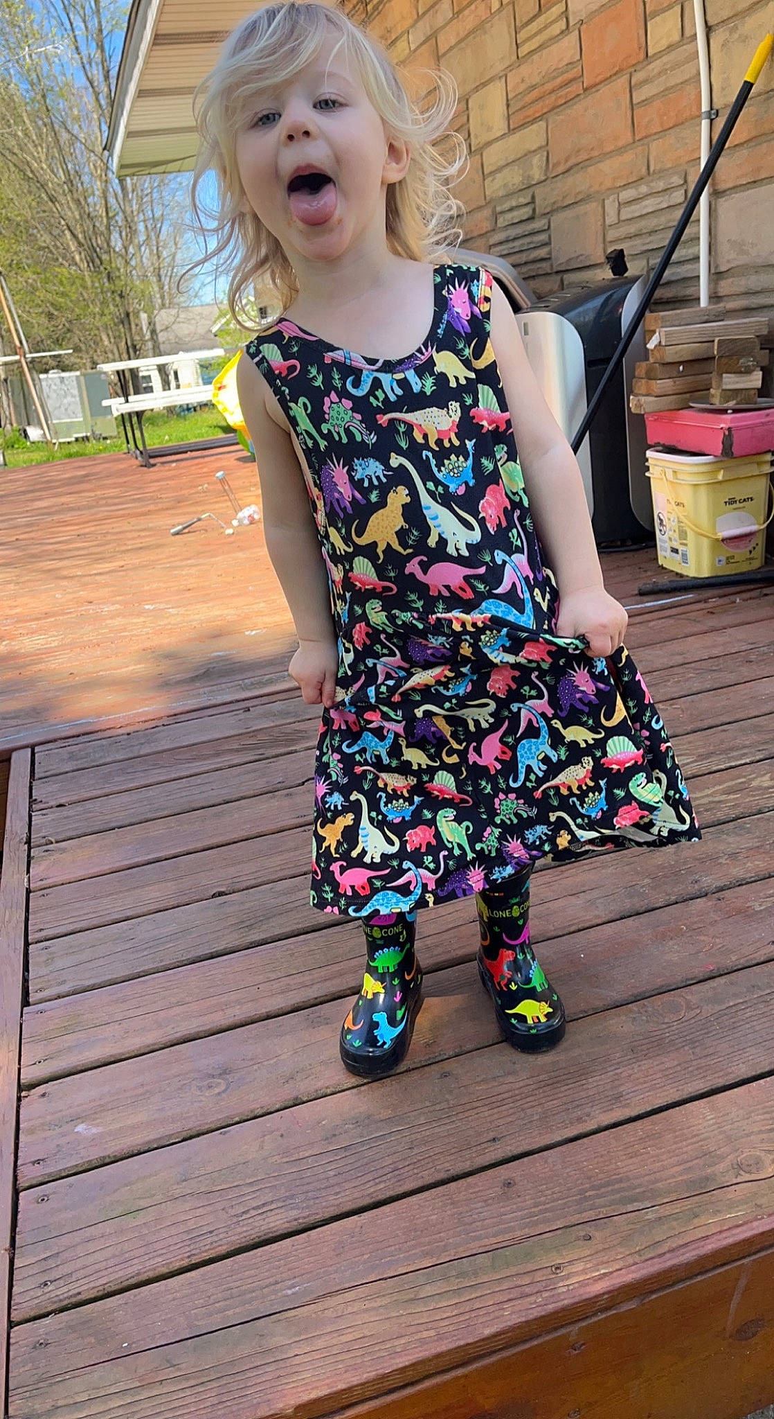 Oaklyn is registered to the contest to win money with this photo: baby_toddler_clothing, blond, day_dress, electric_blue, fun, happy, hardwood, joint, magenta, one_piece_garment, pattern, person, pink, plant, purple, shoulder, sleeve, street_fashion, tree, waist