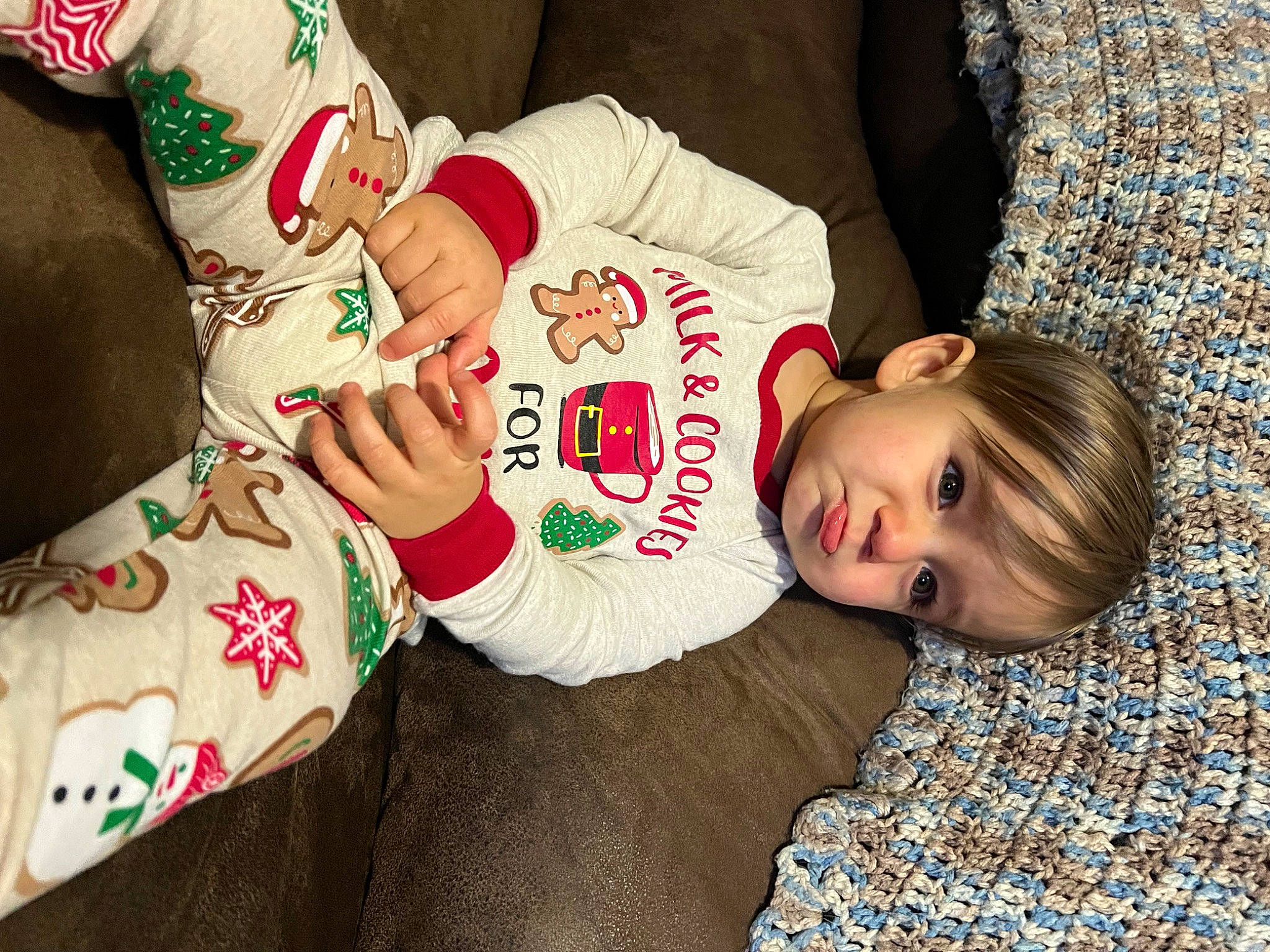 John joined the competition — help win amazing prizes! baby_toddler_clothing, child, christmas, comfort, elbow, event, facial_expression, happy, hat, head, human_leg, lap, pattern, person, sleeve, t_shirt, textile, thigh, toddler, vertebrate