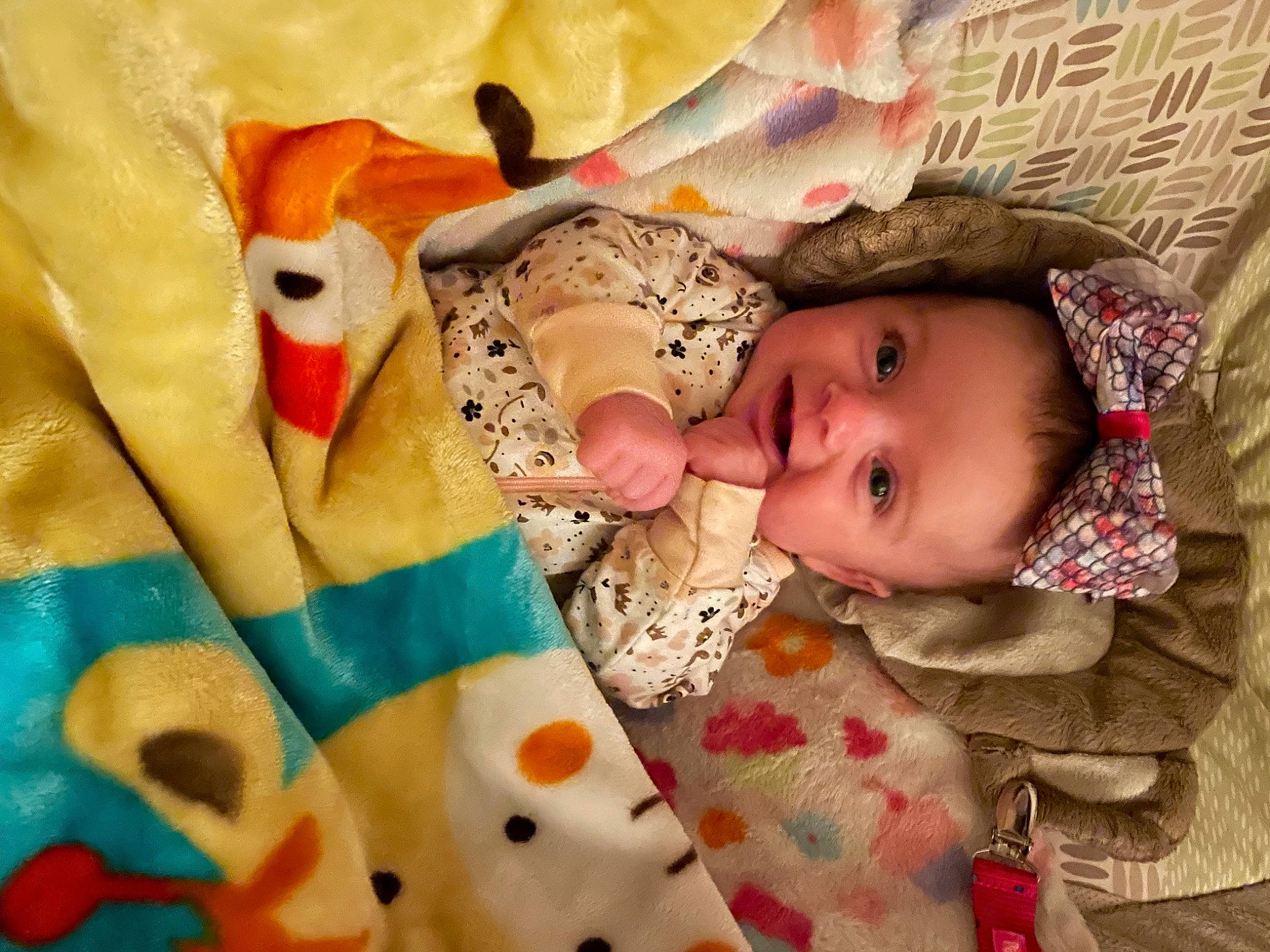 Thaylynn Holloway joined the competition — help win amazing prizes! baby, baby_products, baby_toddler_clothing, cheek, close_up, comfort, eye, face, facial_expression, linens, mammal, nose, pattern, person, pink, product, skin, sleeve, textile, toddler