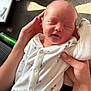 Oliver joined the competition — help win amazing prizes! newborn, baby, infant, sleeping, hands, onesie, clothing, person, indoor, carpet, sunlight, cute, smile, peaceful, human, skin, small, cozy, rest, comfort