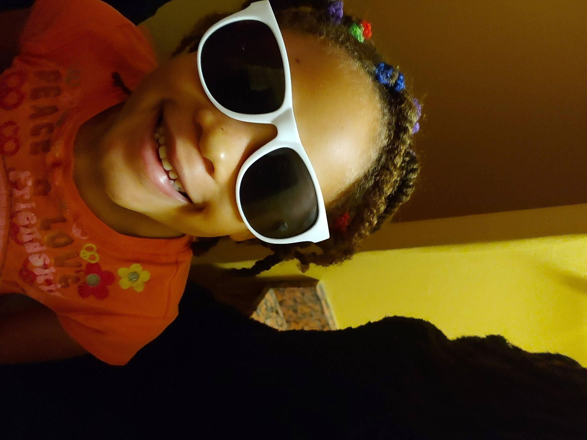 Auset is registered to the contest to win money with this photo: audio_equipment, cheek, child, comfort, eye_glass_accessory, eyewear, fashion_accessory, fun, goggles, happy, joy, nose, person, personal_protective_equipment, room, selfie, smile, sunglasses, vision_care