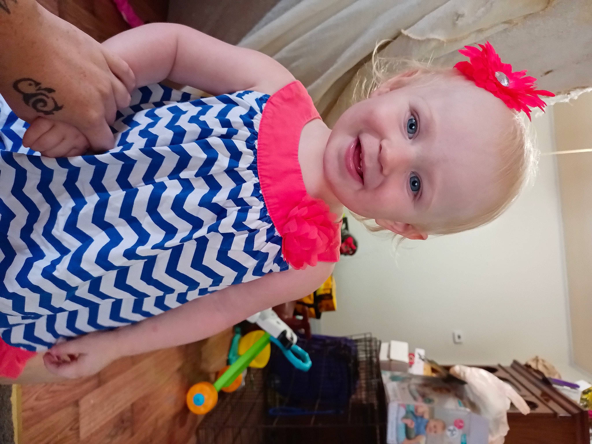 Graclyn joined the competition — help win amazing prizes! baby, baby_products, baby_toddler_clothing, child, dress, electric_blue, fashion_accessory, finger, fun, happy, human_body, human_leg, joy, nail, pattern, person, sitting, sleeve, smile, thigh