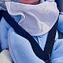 baby, sleeping, blue_hat, knitwear, car_seat, baby_bib, baby_clothing, infant, peaceful, child, cute, pom_poms, blanket, seatbelt, portrait, face, young_child, indoors, soft_texture, cozy