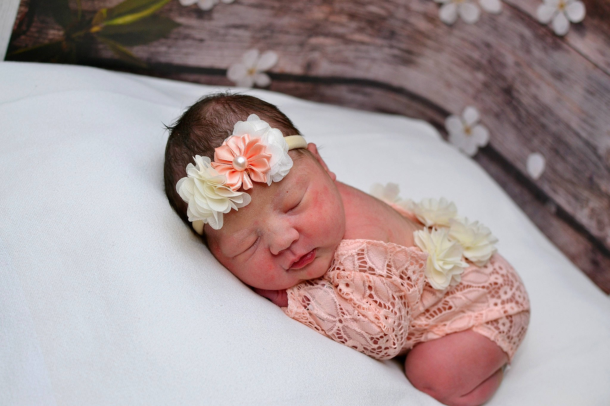 Izabelle is registered to the contest to win money with this photo: baby, baby_toddler_clothing, bridal_accessory, dress, embellishment, flower, hair_accessory, headband, headgear, headpiece, headwear, jewellery, linens, peach, person, petal, pink, plant, rose, tableware