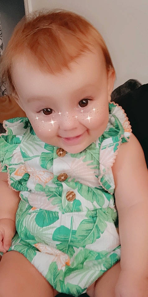 Izabelle joined the competition — help win amazing prizes! arm, baby, baby_toddler_clothing, cheek, dress, eye, eyelash, finger, hand, human_body, iris, lip, mouth, neck, nose, person, pink, skin, sleeve, smile