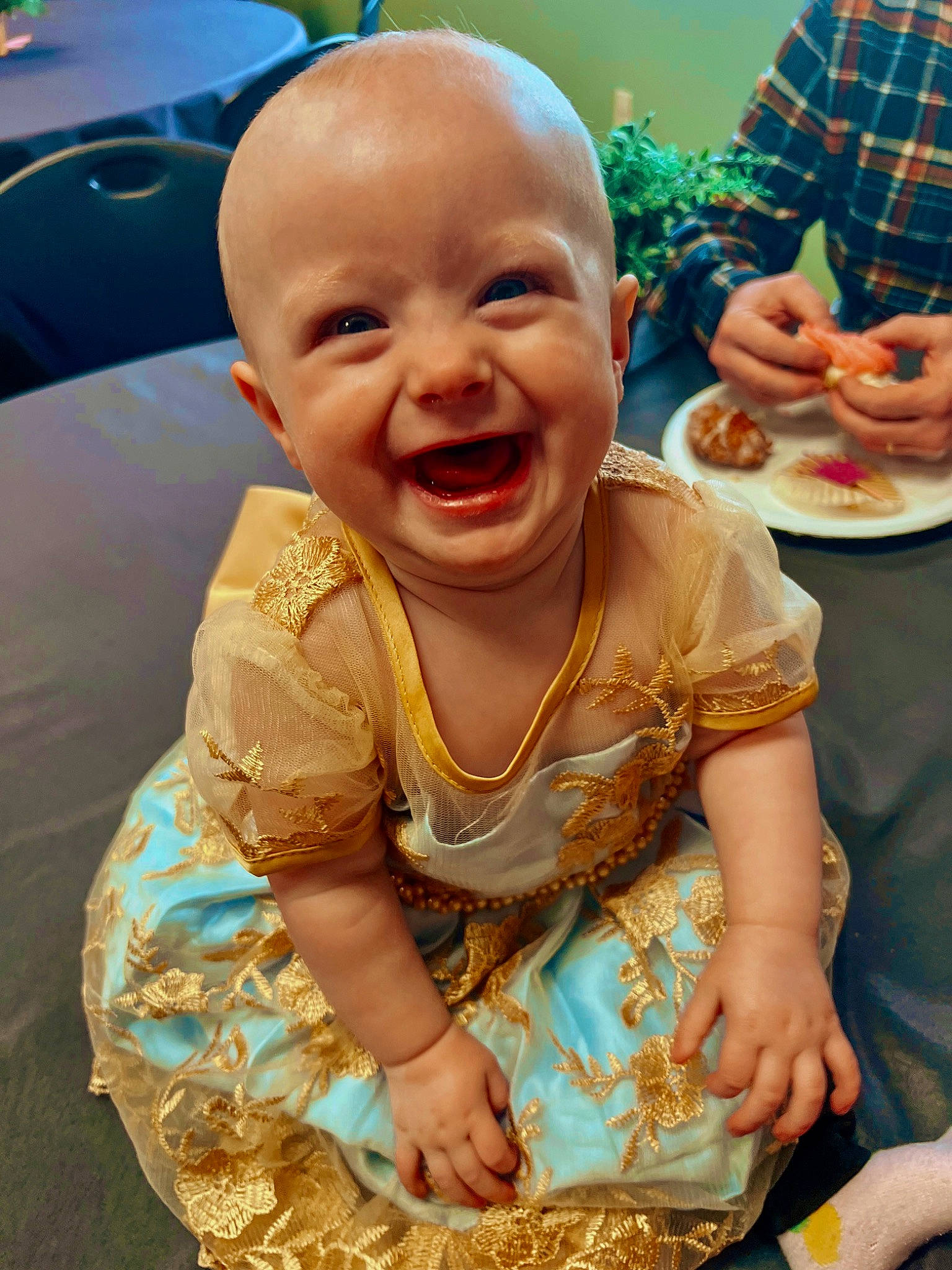 Evelynn joined the competition — help win amazing prizes! baby, baby_toddler_clothing, chair, child, cuisine, dish, event, food, fun, happy, laugh, mouth, person, plate, recreation, sitting, skin, smile, t_shirt, tableware