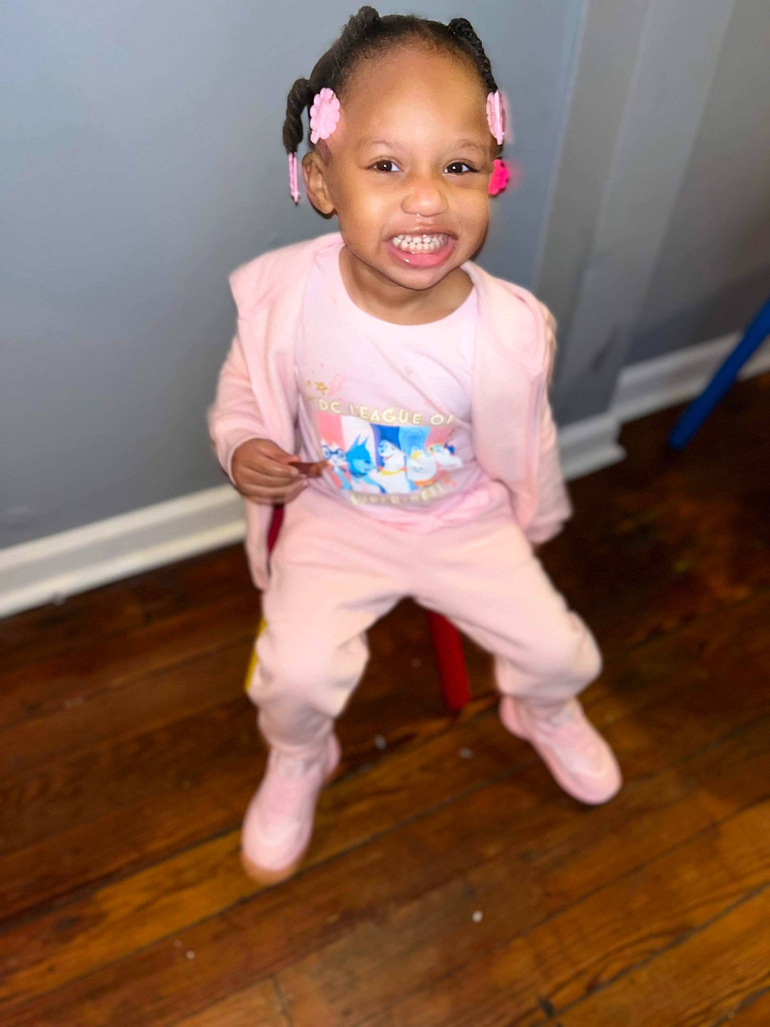 Kyleigh is registered to the contest to win money with this photo: baby, baby_toddler_clothing, cheek, chin, eye, face, flash_photography, flooring, happy, hardwood, head, joy, laminate_flooring, person, skin, sleeve, smile, t_shirt, toddler, wood