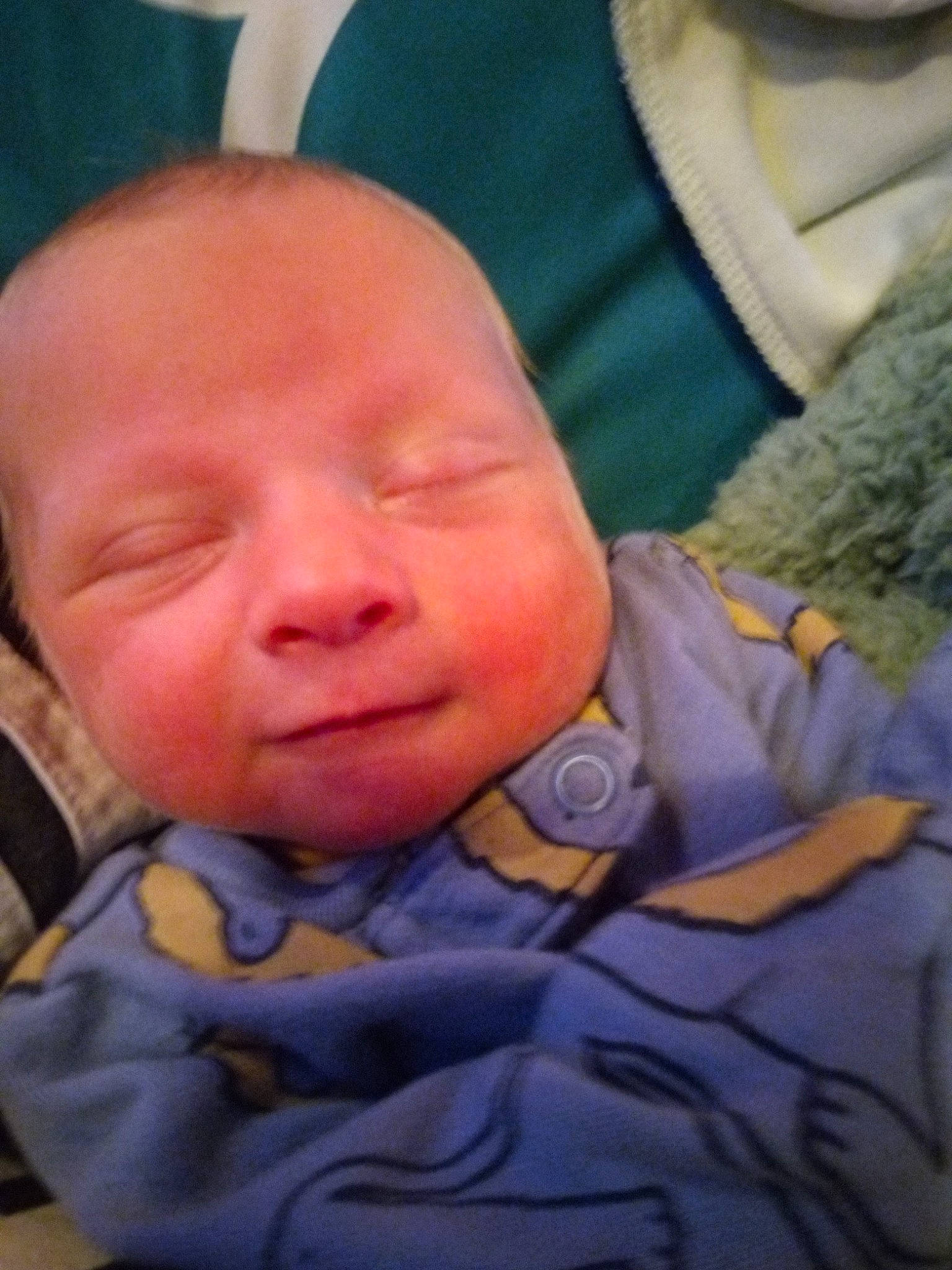 Mavrick is registered to the contest to win money with this photo: baby, baby_toddler_clothing, cheek, child, chin, comfort, cool, eyebrow, facial_expression, finger, forehead, fun, grass, happy, mouth, nose, person, skin, smile, textile