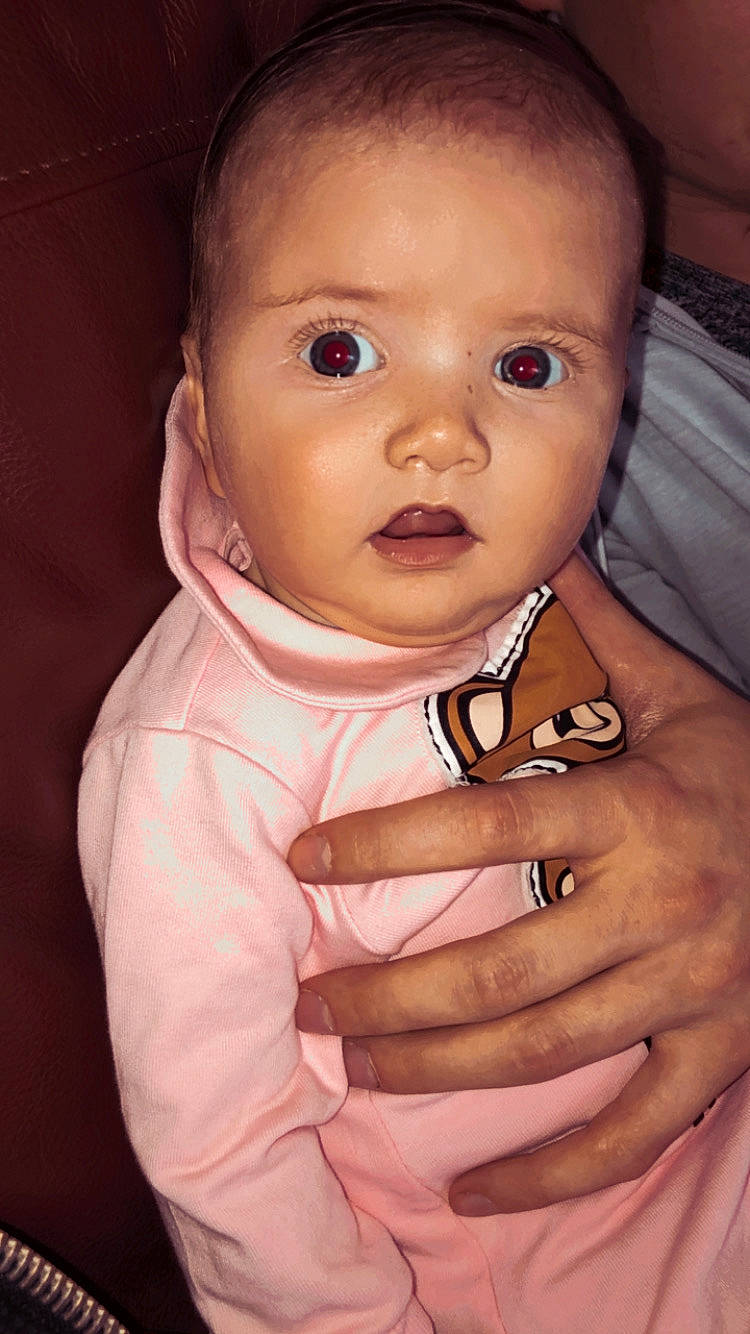 Connie is registered to the contest to win money with this photo: baby, cheek, child, chin, ear, eye, eyebrow, face, finger, forehead, head, lip, mouth, neck, nose, person, skin, surprise, toddler