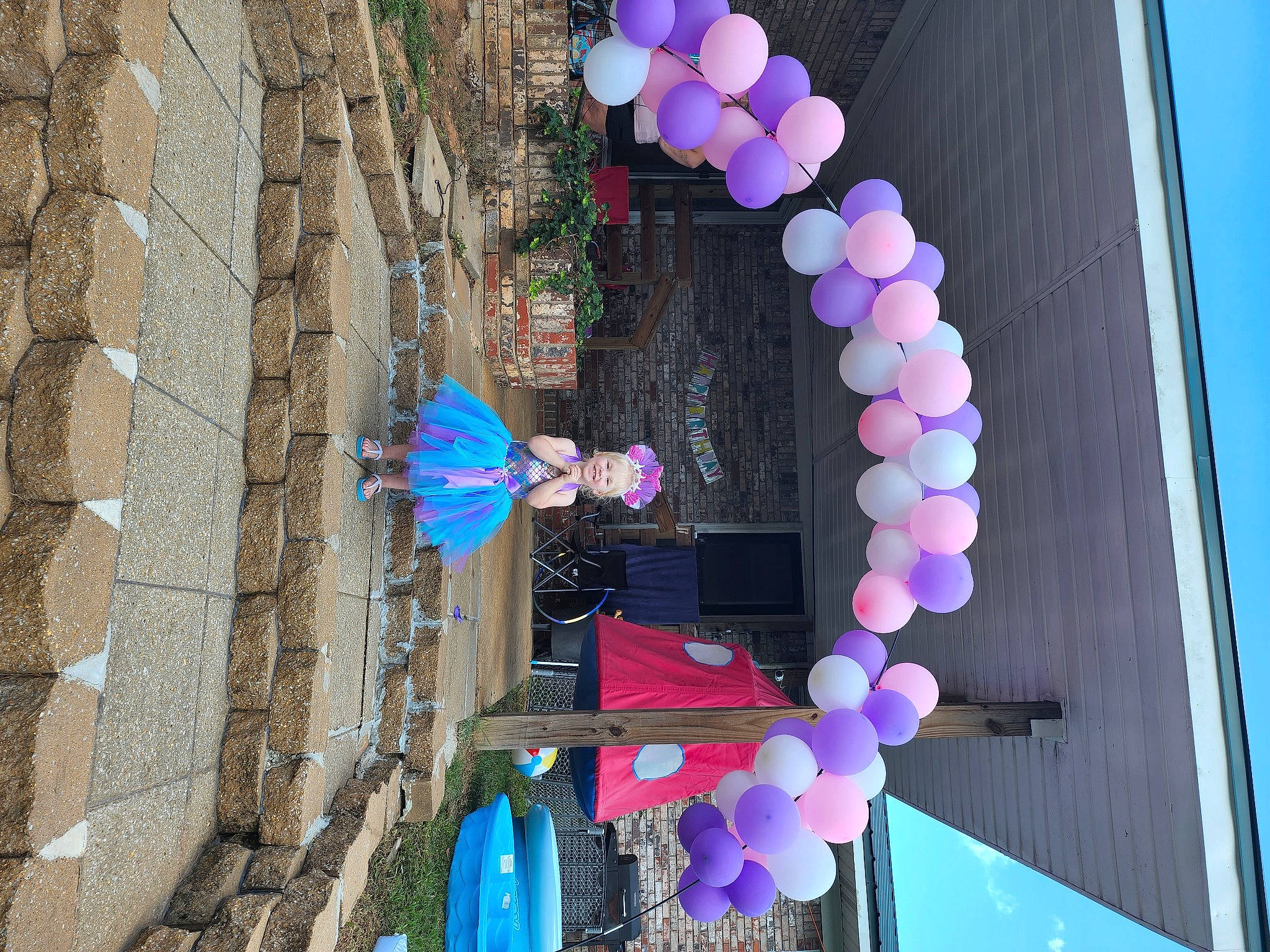 Nevaeh joined the competition — help win amazing prizes! arch, automotive_wheel_system, azure, balloon, blue, electric_blue, event, fun, joy, leisure, magenta, party_supply, pattern, person, pink, plant, purple, toy, tree, violet