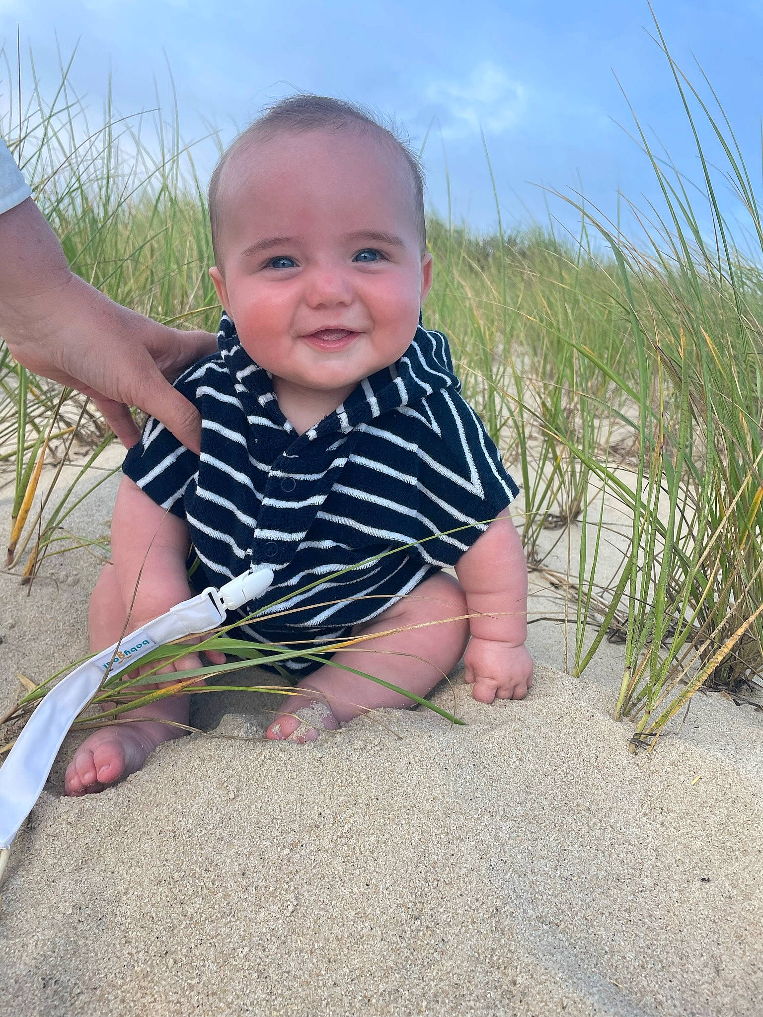Owen joined the competition — help win amazing prizes! baby, baby_toddler_clothing, barefoot, child, cloud, finger, foot, fun, grass, grass_family, happy, joy, leg, pattern, people_in_nature, person, plant, sitting, sky, smile