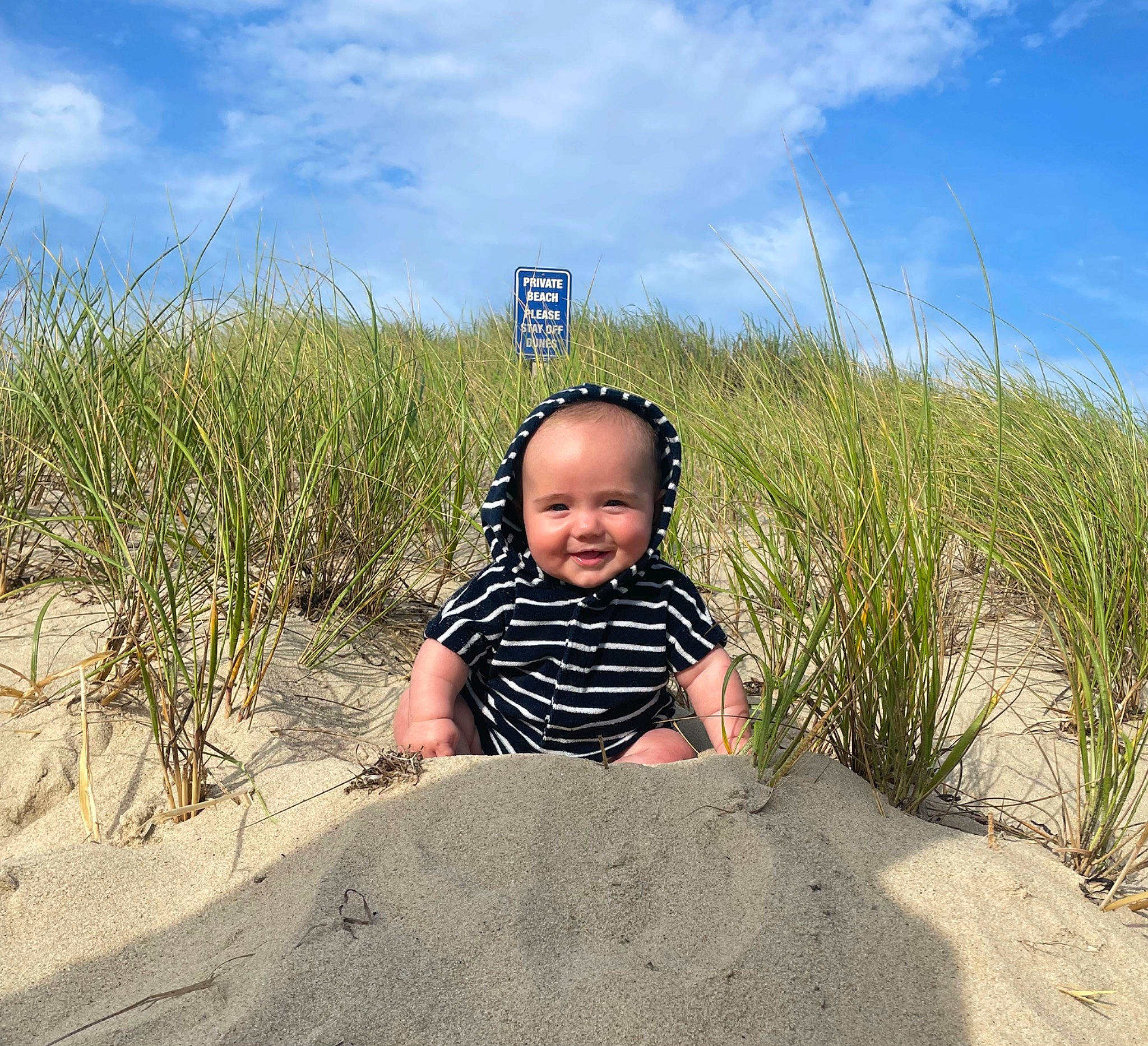 Owen joined the competition — help win amazing prizes! baby, baby_toddler_clothing, cloud, fun, grass, grassland, happy, horizon, joy, landscape, leisure, people_in_nature, person, plant, prairie, sand, sitting, sky, smile, soil