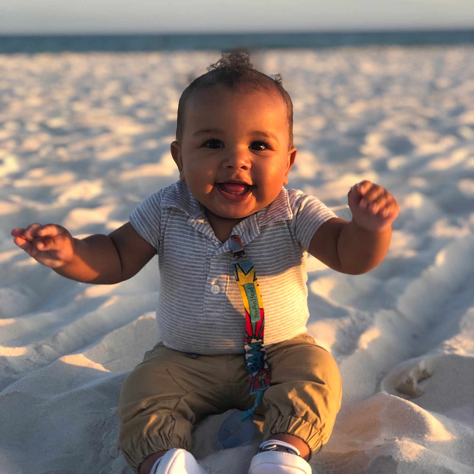 Marcellus is registered to the contest to win money with this photo: baby, beach, child, coast, finger, fun, hand, happy, ocean, person, photography, play, sand, sea, sky, smile, summer, thumb, toddler, vacation