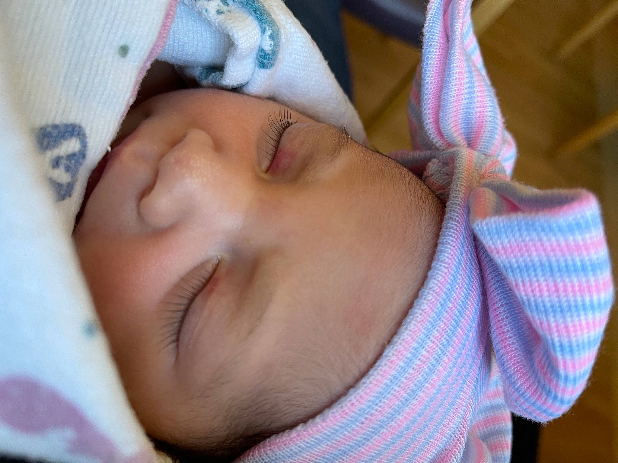 Melia is registered to the contest to win money with this photo: baby, baby_sleeping, baby_toddler_clothing, beauty, cheek, chin, close_up, comfort, eye, eyebrow, eyelash, finger, head, headwear, iris, linens, lip, mouth, nose, person