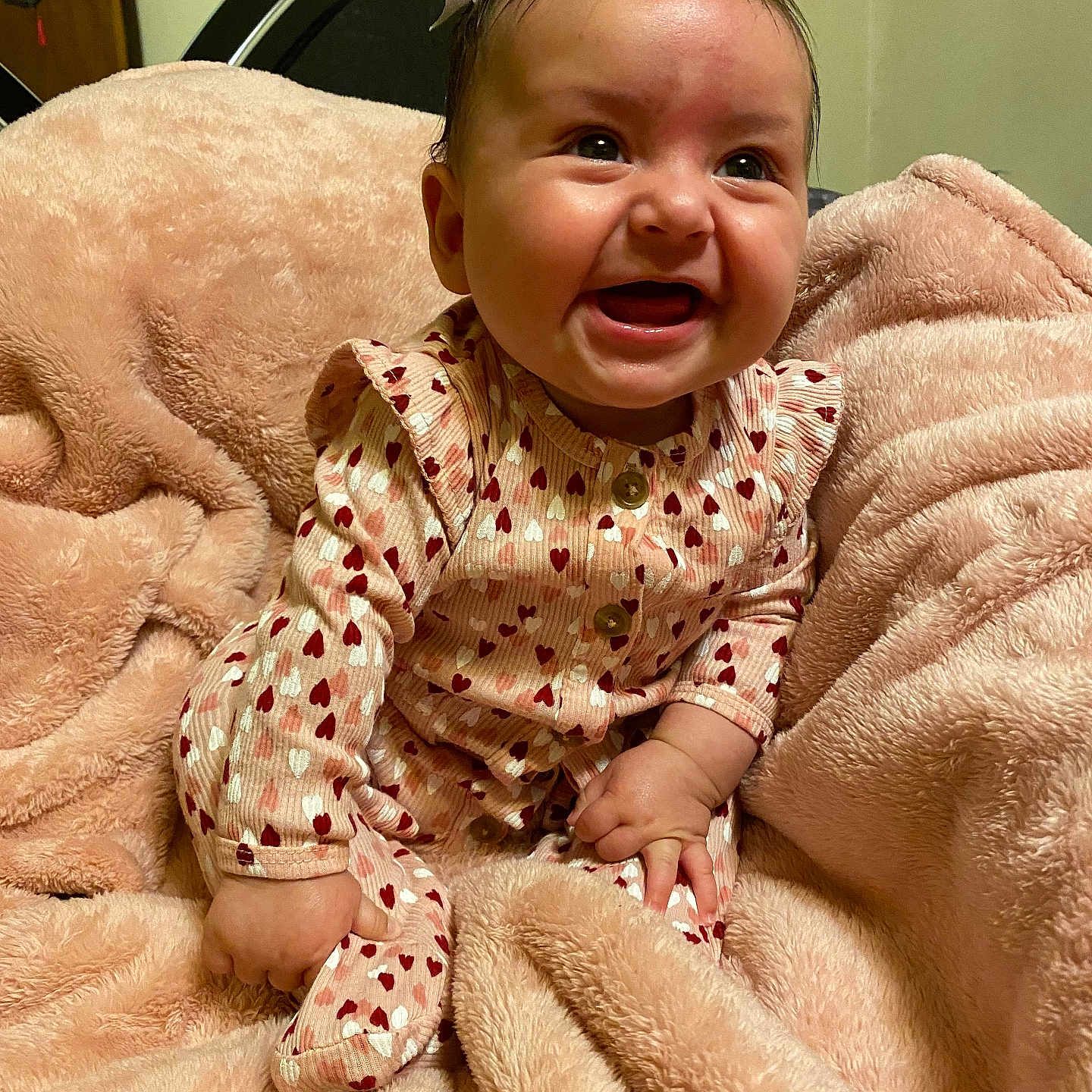 Akiera is registered to the contest to win money with this photo: baby, babylaughing, blanket, face, happy, head, laughing, person, photography, portrait, quilt, smile