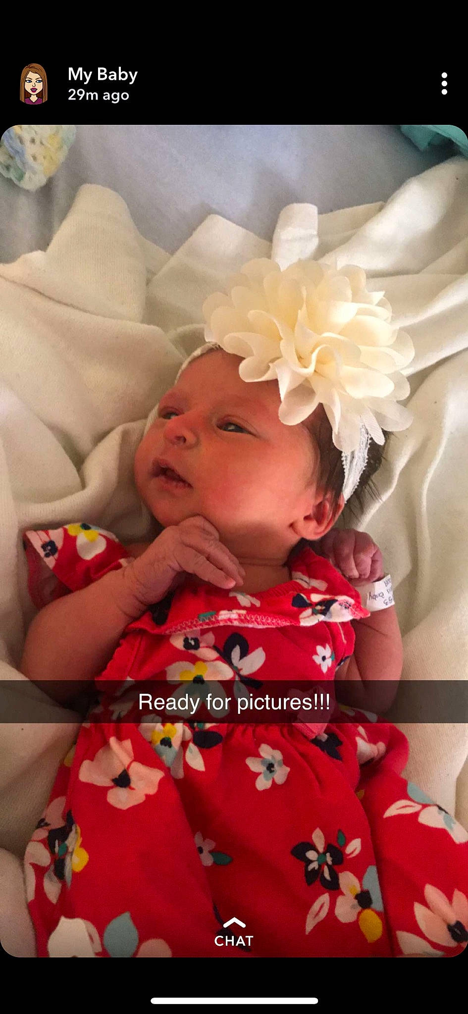 Leena is registered to the contest to win money with this photo: baby, baby_products, cheek, child, finger, flower, hair_accessory, head, headband, headgear, mouth, nose, person, petal, photography, plant, product, red, skin, textile