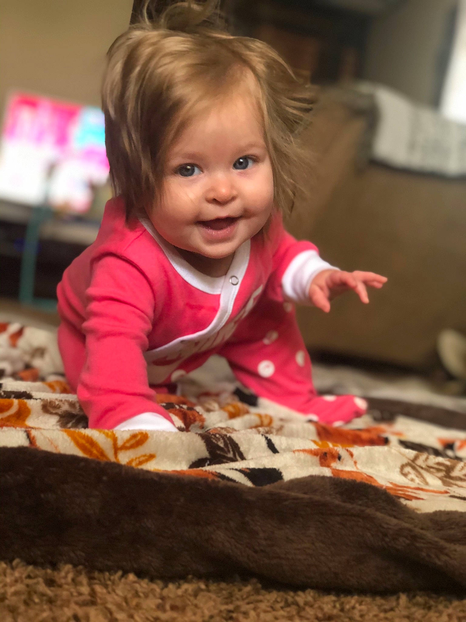 Leena is registered to the contest to win money with this photo: baby, cheek, child, face, fun, head, person, play, sitting, skin, smile, toddler