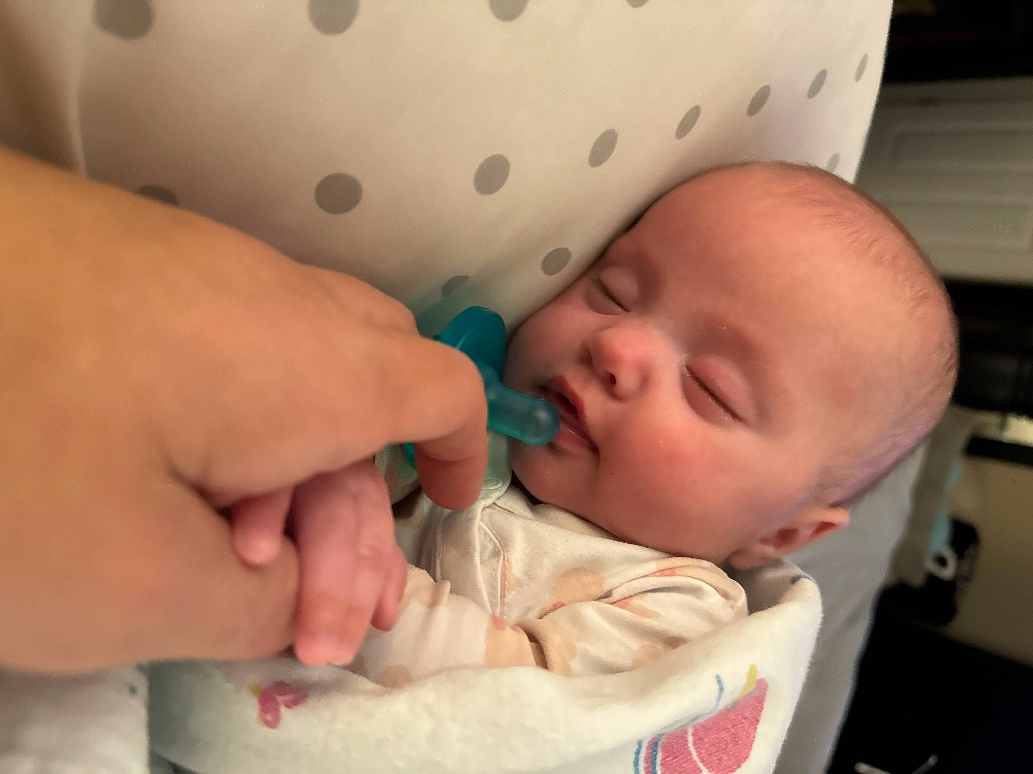 Allison is registered to the contest to win money with this photo: baby, baby_products, baby_toddler_clothing, bedtime, cheek, child, comfort, face, finger, happy, head, linens, mouth, nail, nose, pattern, person, room, skin, thumb