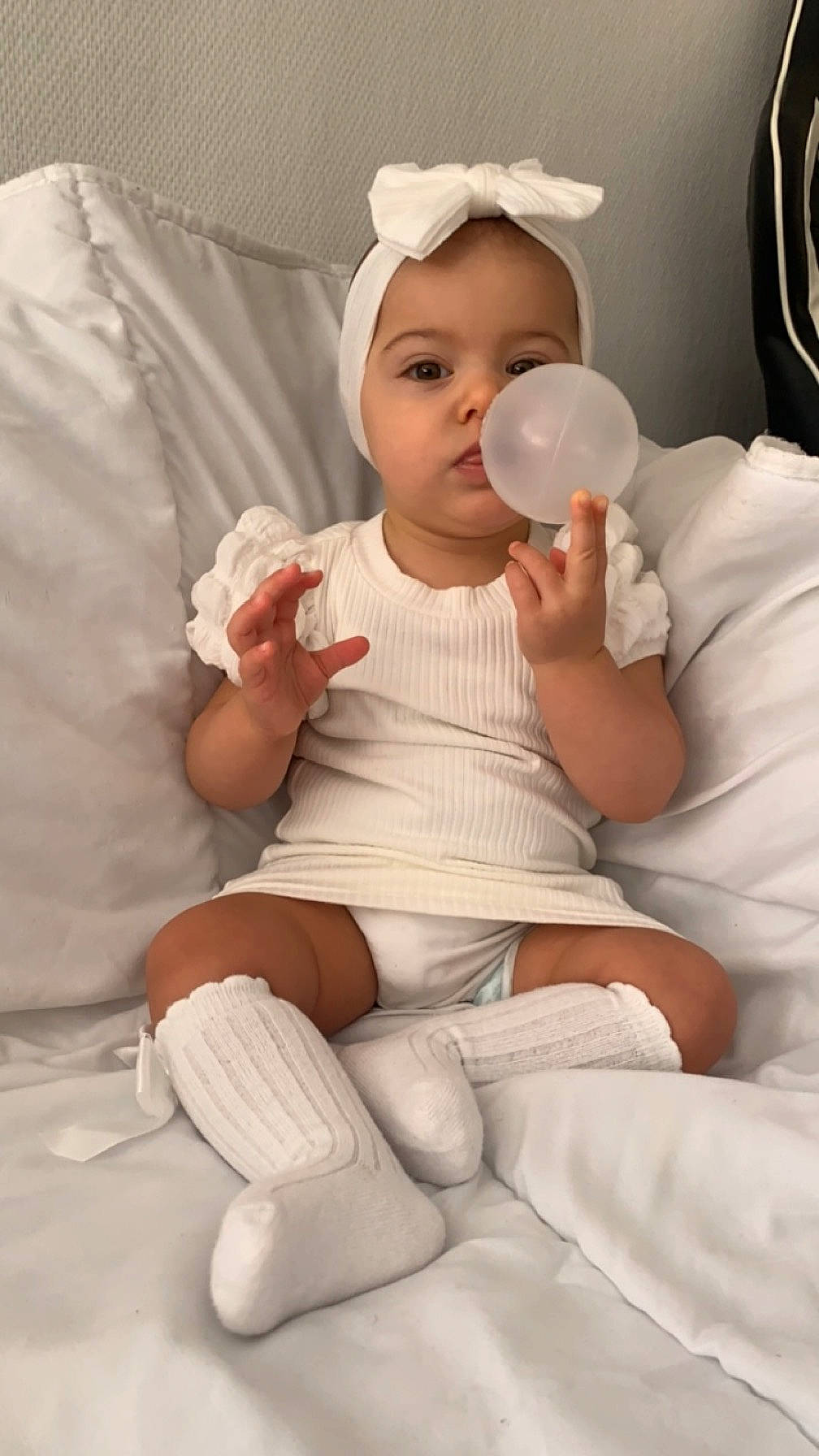 Lyana participe au concours pour gagner de l'argent avec cette photo : arm, baby, baby_toddler_clothing, cheek, comfort, eye, eyelash, finger, gesture, hairstyle, hand, human_body, knee, lip, neck, person, skin, sleeve, thigh, thumb