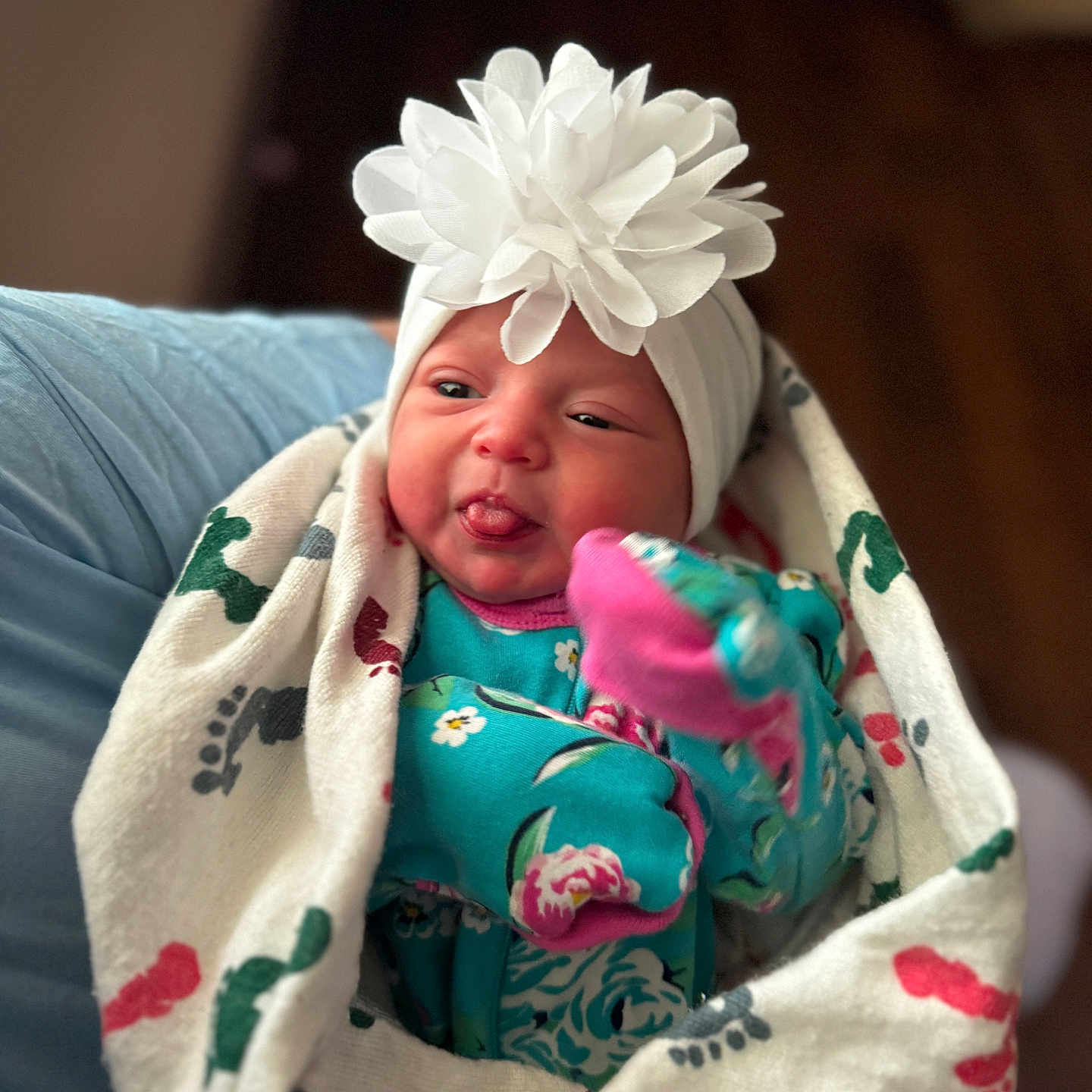 Sylvia joined the competition — help win amazing prizes! baby, blanket, bodypart, bonnet, clothing, couch, cushion, face, finger, furniture, glove, hand, hat, head, homedecor, newborn, person, photography, portrait, towel