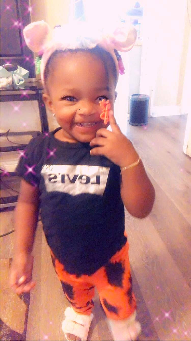 Angenise is registered to the contest to win money with this photo: baby_toddler_clothing, cheek, cool, face, facial_expression, floor, fun, gesture, hair, hairstyle, happy, head, iris, joy, neck, person, shoulder, skin, sleeve, smile