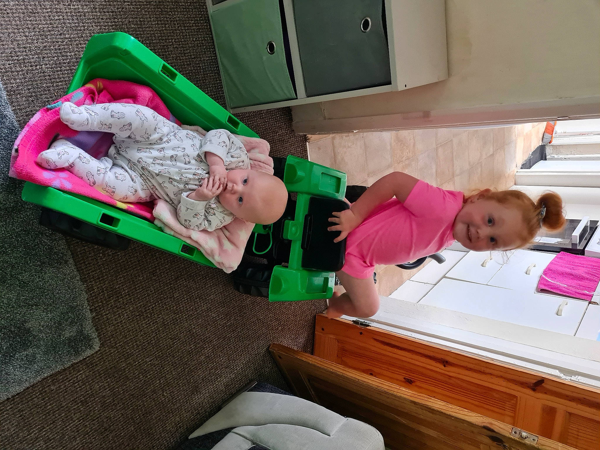 Gracie-may joined the competition — help win amazing prizes! baby, baby_products, chest_of_drawers, child, comfort, drawer, dress, happy, joy, lap, leg, leisure, magenta, office_supplies, person, room, shipping_box, sitting, sock, thigh