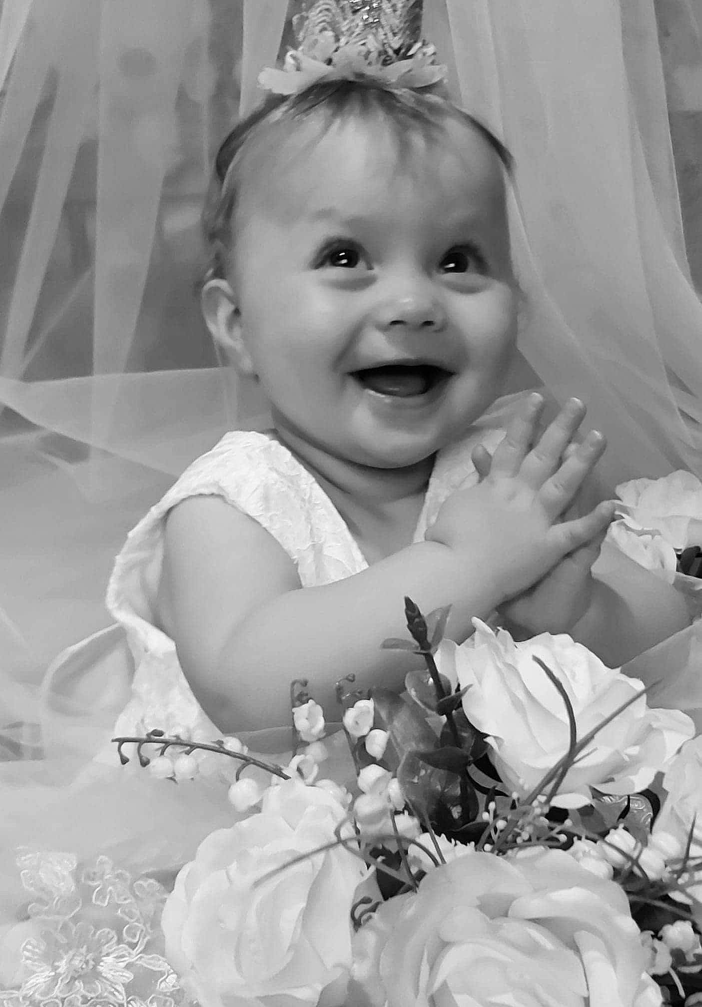 Courtney joined the competition — help win amazing prizes! baby, black_and_white, child, dress, eye, face, facial_expression, hair_accessory, happy, head, headpiece, joy, monochrome, monochrome_photography, people, person, photograph, photography, skin, smile