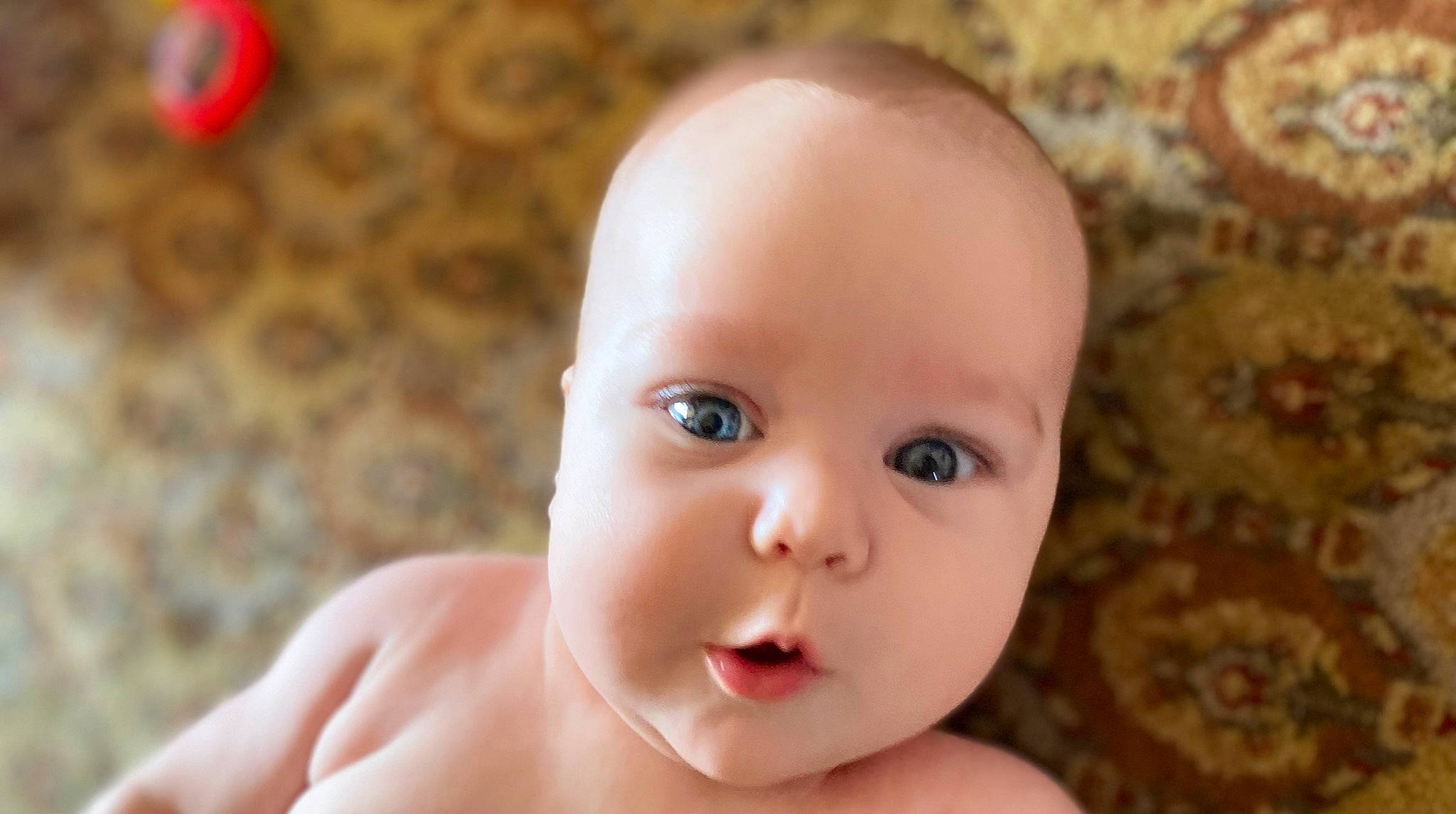 Addie joined the competition — help win amazing prizes! baby, cheek, eye, eyebrow, eyelash, face, flash_photography, happy, head, human_body, iris, lip, mouth, nail, nose, person, skin, smile, thumb, toddler