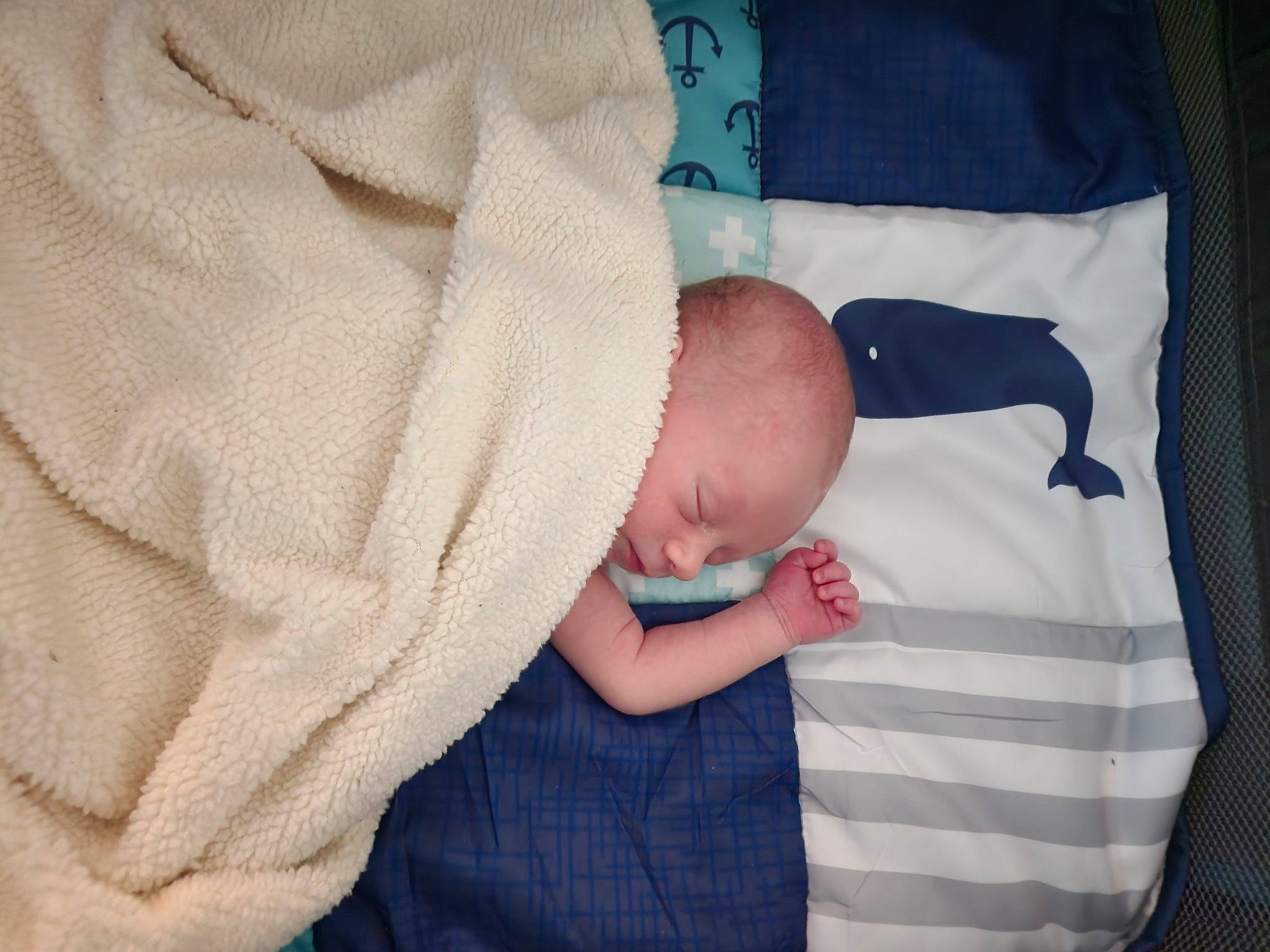 Jeremy is registered to the contest to win money with this photo: baby, baby_products, baby_sleeping, baby_toddler_clothing, child, comfort, linens, nail, pattern, peach, person, room, sleeve, textile, thumb, toddler