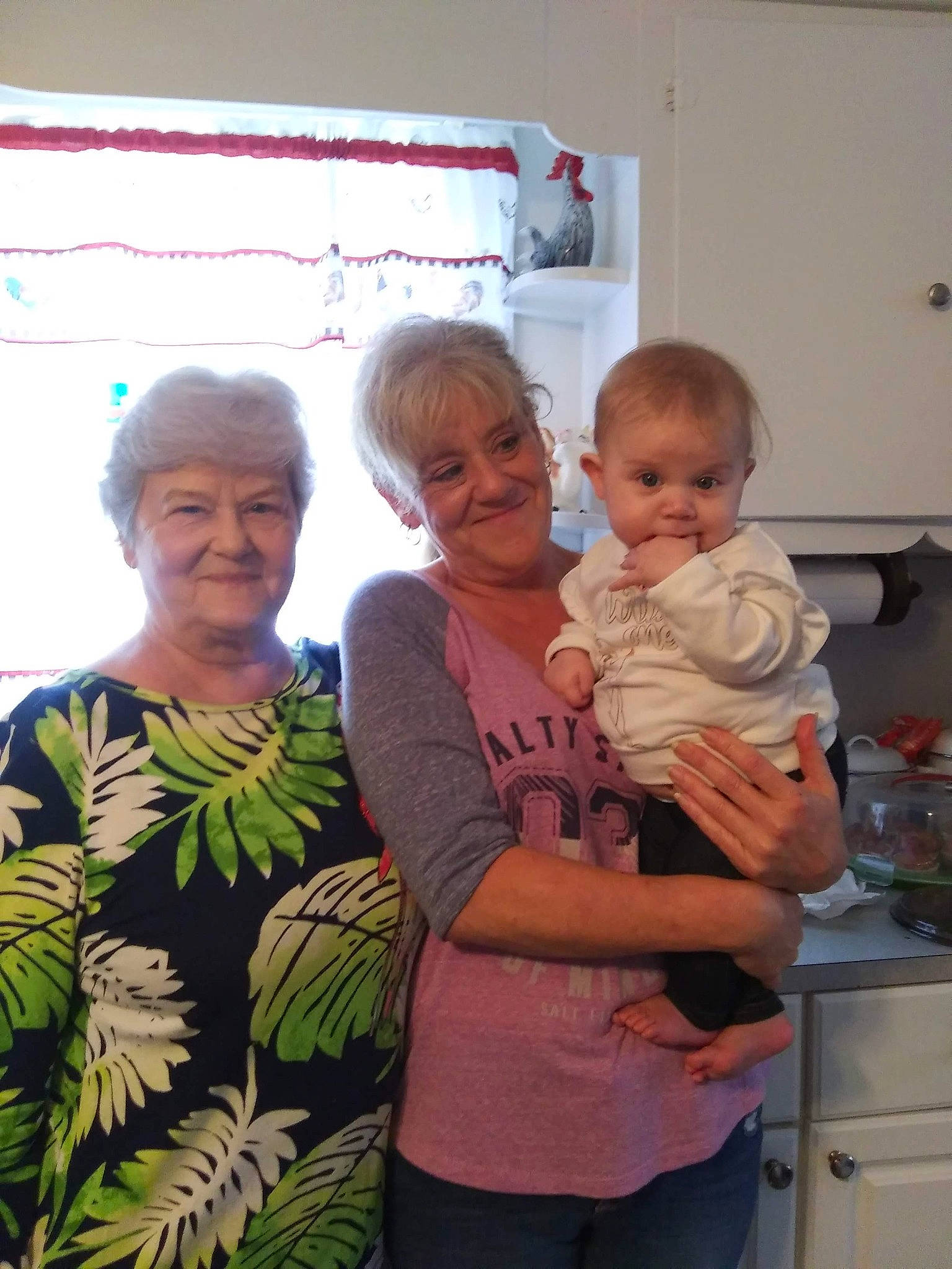 Lauren is registered to the contest to win money with this photo: baby, baby_toddler_clothing, cabinetry, countertop, eye, home_appliance, joy, kitchen, kitchen_appliance, major_appliance, person, shoulder, standing