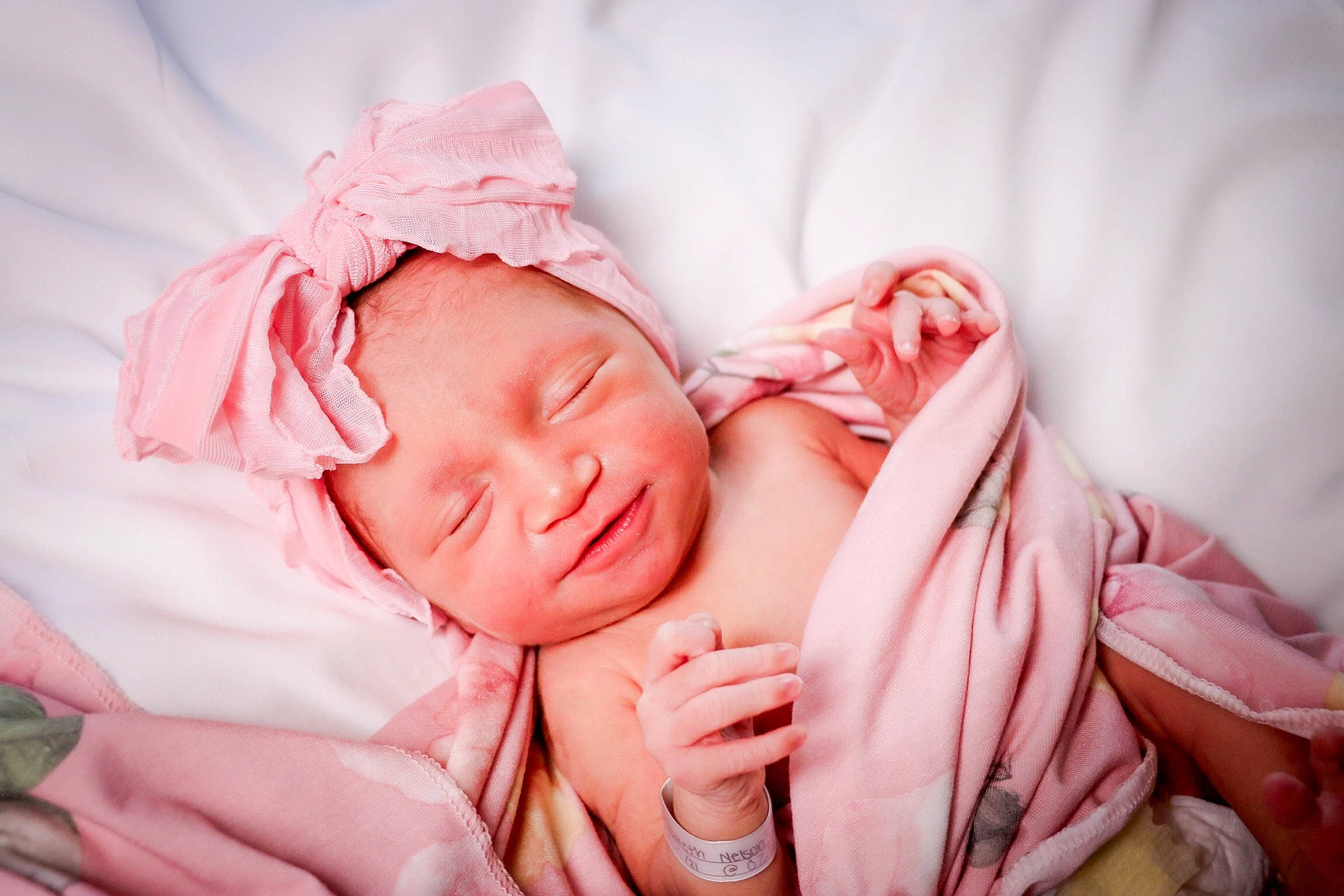 Alaiyah is registered to the contest to win money with this photo: baby, baby_sleeping, bedtime, child, comfort, eye, face, flash_photography, gesture, happy, head, headpiece, headwear, linens, lip, nail, nap, peach, person, pink