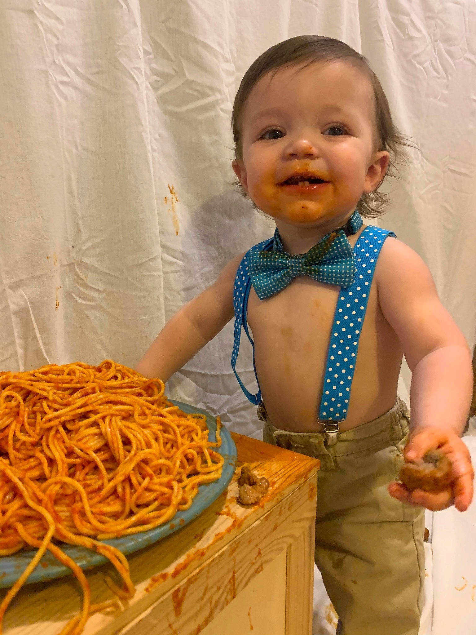 Alvin is registered to the contest to win money with this photo: child, chinese_food, cuisine, dish, food, noodle, person, spaghetti
