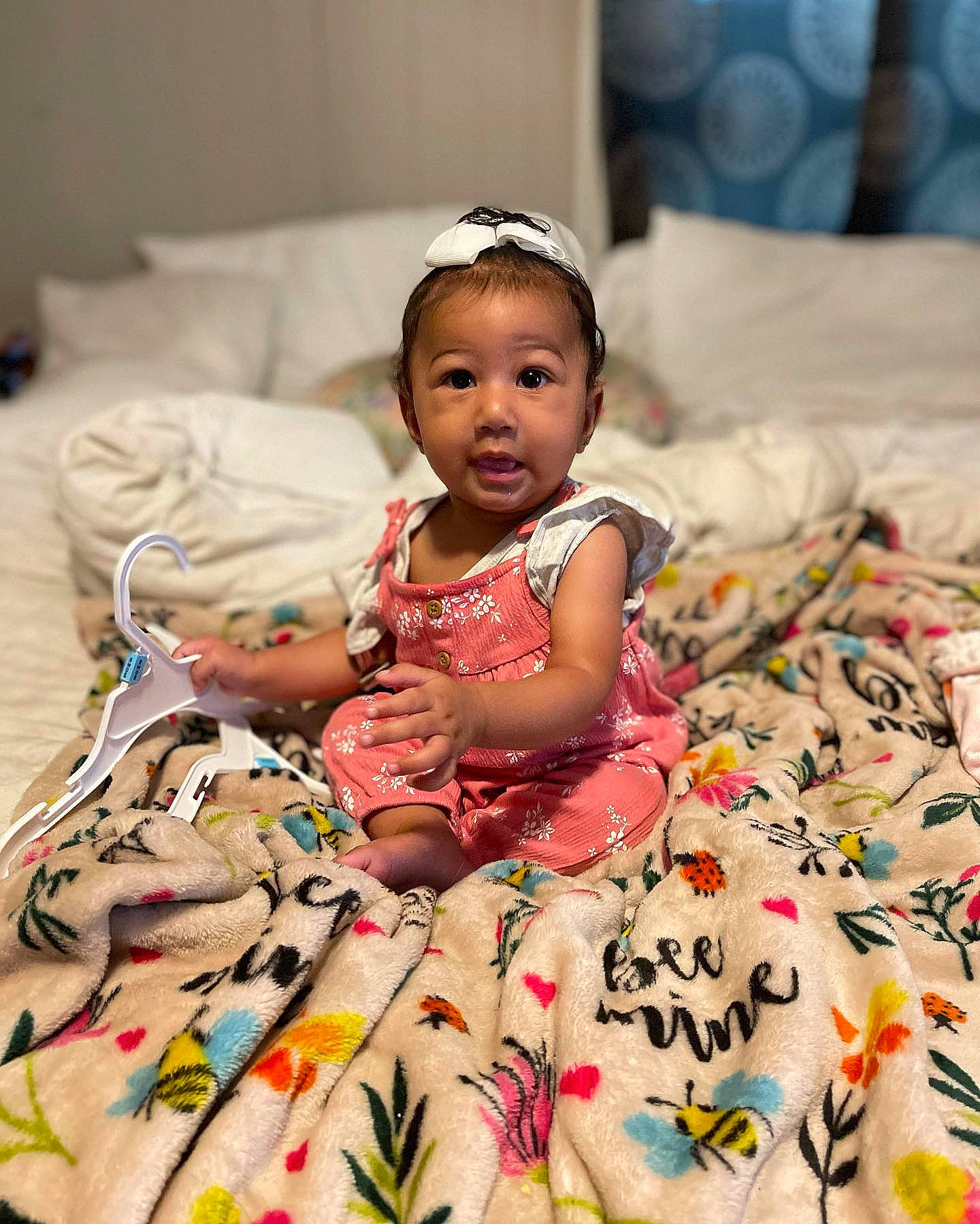 Arayah joined the competition — help win amazing prizes! baby, baby_toddler_clothing, child, comfort, dress, event, eye, face, flash_photography, flooring, fun, happy, head, linens, pattern, person, room, sitting, skin, textile