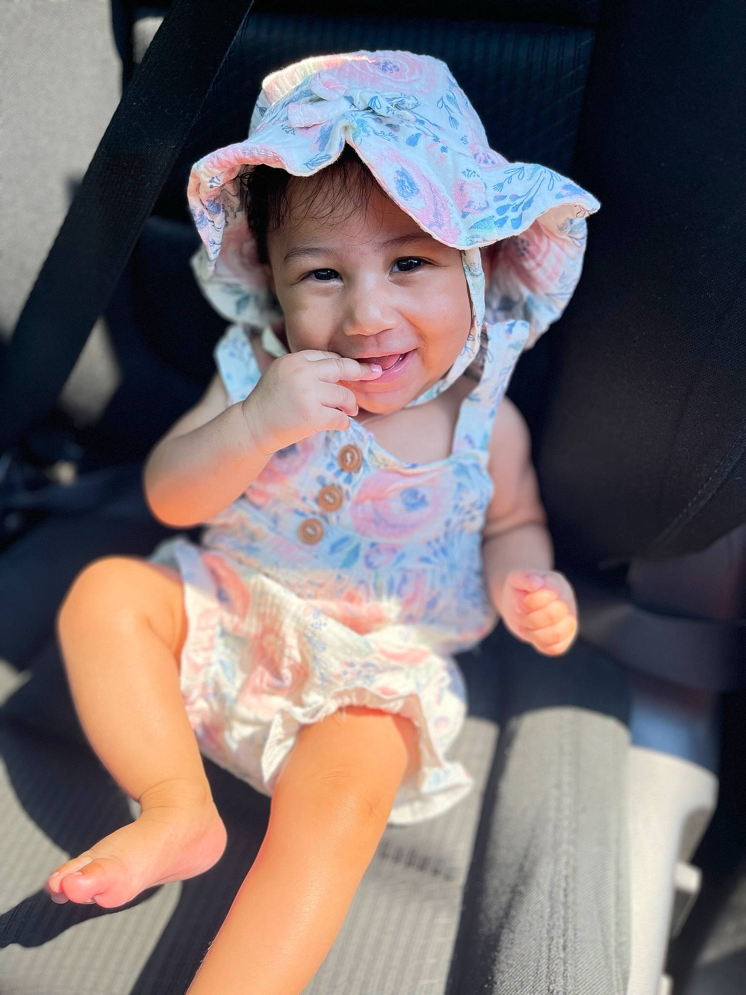 Arayah is registered to the contest to win money with this photo: baby, baby_toddler_clothing, beauty, cap, child, dress, eye, fun, grass, happy, hat, head, headgear, headwear, joy, lip, person, pink, skin, smile