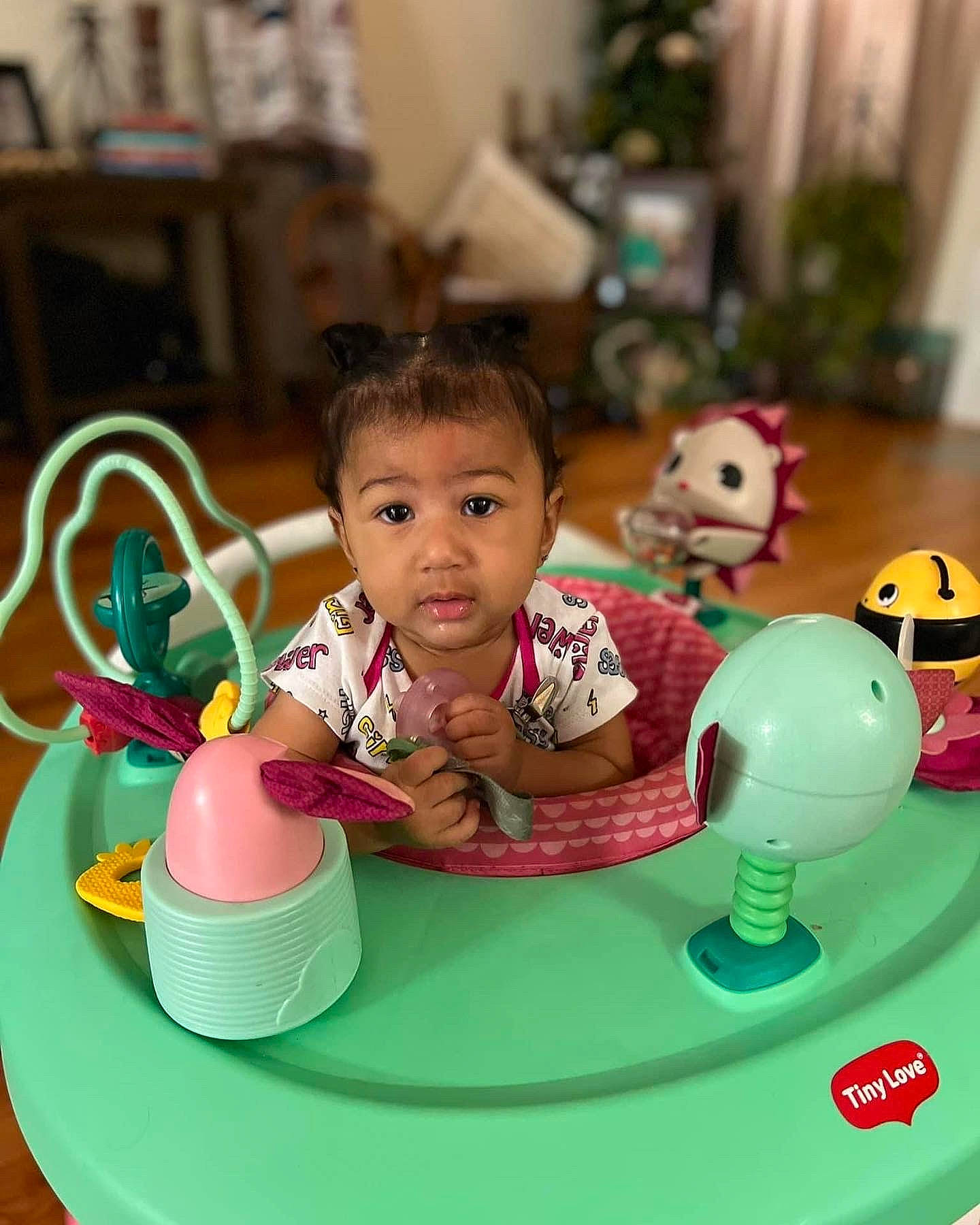 Arayah is registered to the contest to win money with this photo: baby, baby_playing_with_toys, baby_toys, chair, child, drinkware, event, fun, games, green, happy, leisure, person, plastic, play, recreation, sharing, sitting, table, tableware