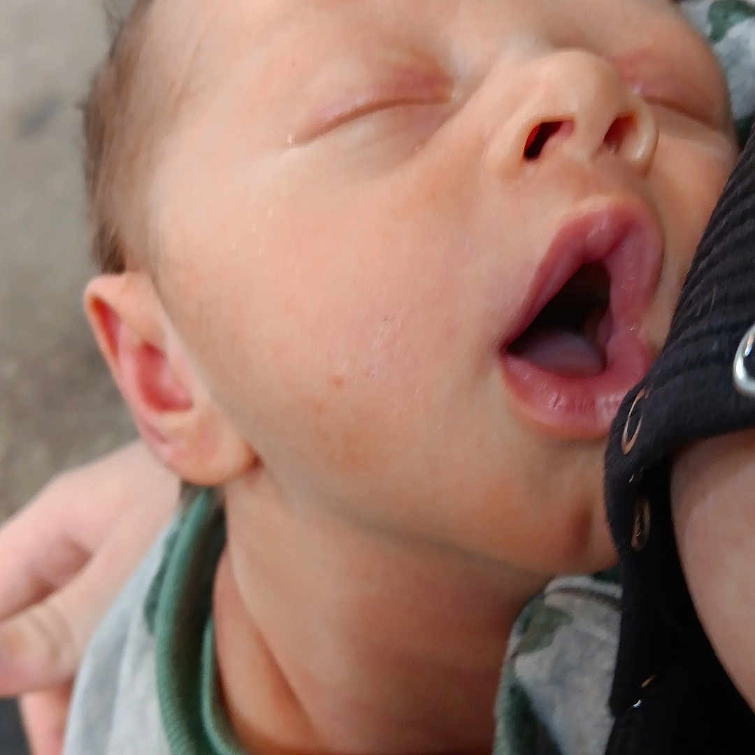 Joseph joined the competition — help win amazing prizes! baby, bodypart, clothing, face, finger, hand, happy, head, knitwear, laughing, mouth, neck, newborn, person, photography, portrait, sweater, teeth, tongue, yawning