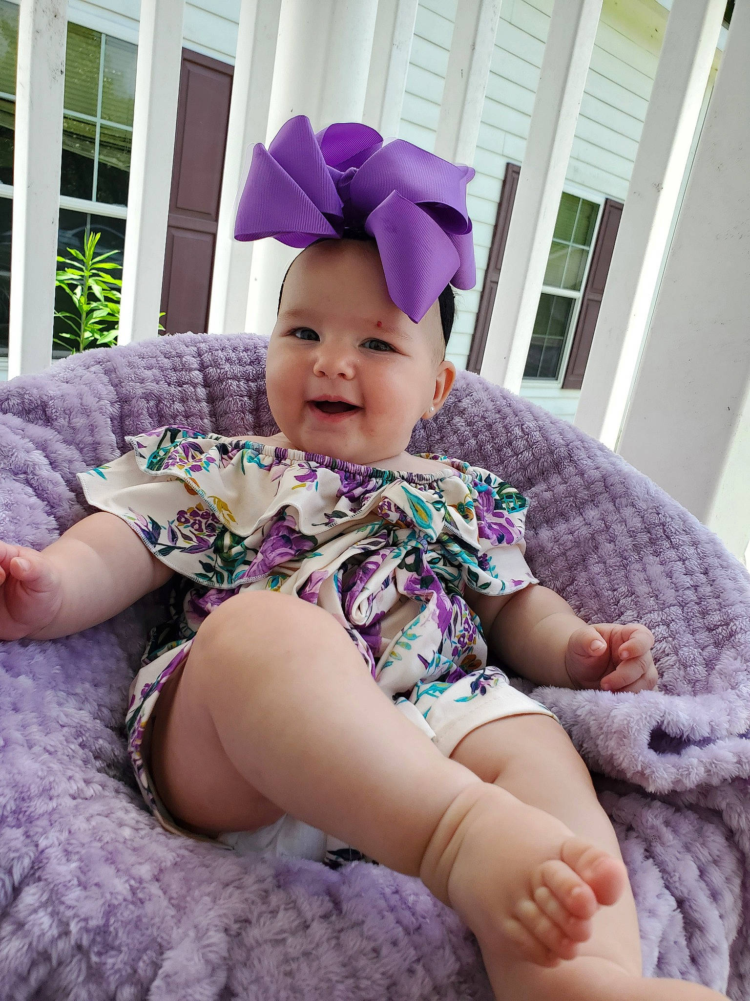 Bayleigh Journey joined the competition — help win amazing prizes! baby, baby_toddler_clothing, child, ear, finger, headgear, headwear, human_leg, lavender, leg, person, pink, purple, sitting, thigh, toddler