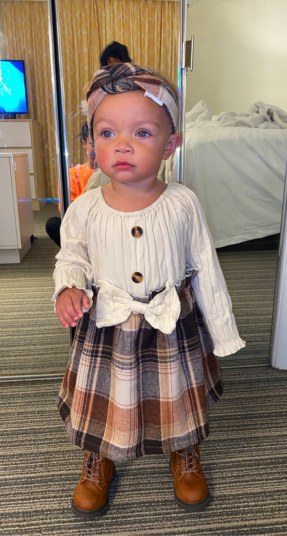 Makenna joined the competition — help win amazing prizes! baby, baby_toddler_clothing, child, day_dress, dress, embellishment, eyewear, face, fashion_accessory, fashion_design, flooring, formal_wear, one_piece_garment, pattern, person, personal_protective_equipment, plaid, sleeve, sock, tartan