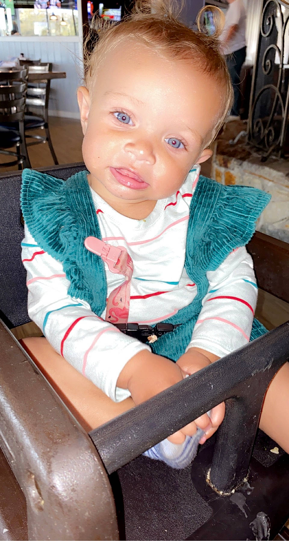 Makenna is registered to the contest to win money with this photo: baby, baby_products, baby_toddler_clothing, chair, cheek, child, comfort, elbow, eye, finger, fun, happy, human_body, iris, lap, lip, nose, person, sitting, skin