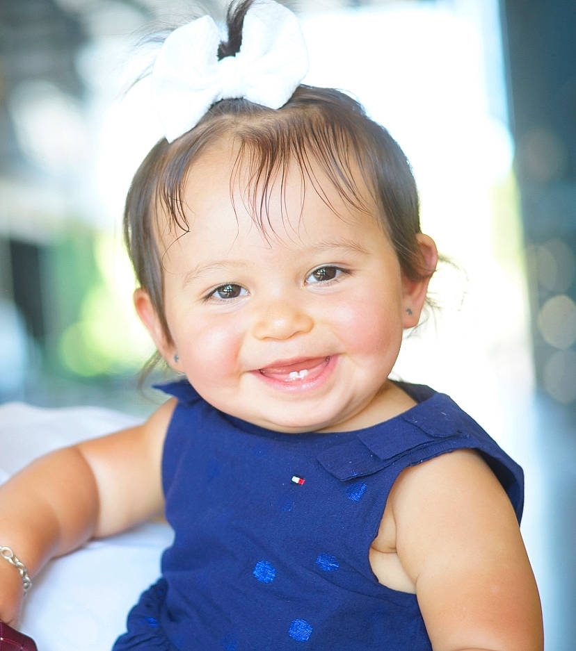 Gwendolyn is registered to the contest to win money with this photo: baby, baby_toddler_clothing, bracelet, cheek, child, child_model, day_dress, eyelash, facial_expression, hair_accessory, happy, headband, headpiece, iris, joy, person, portrait_photography, skin, toddler