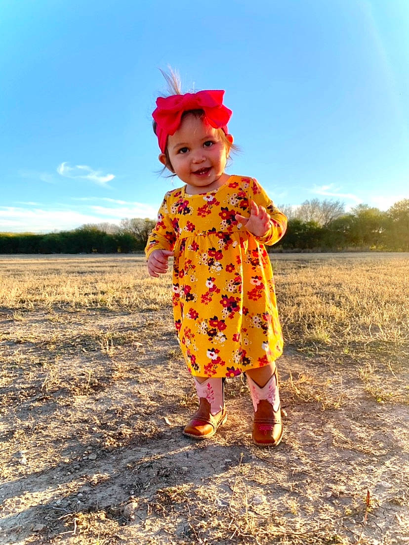 Gwendolyn joined the competition — help win amazing prizes! baby, baby_toddler_clothing, child, child_model, costume, costume_accessory, day_dress, field, happy, headwear, human, joy, magenta, mouth, people_in_nature, person, photo_shoot, pink, portrait_photography, prairie