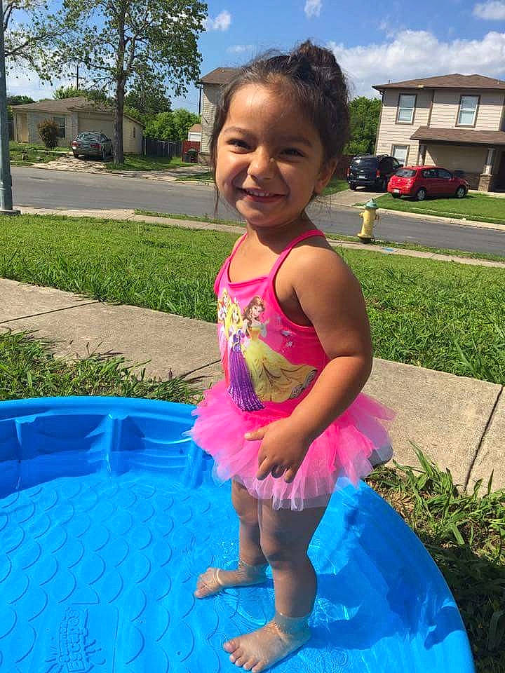 Alessa is registered to the contest to win money with this photo: child, clothing, day, fun, girl, happiness, infant, joy, leg, leisure, pink, play, recreation, smile, summer, swimming_pool, swimwear, toddler, vacation, water