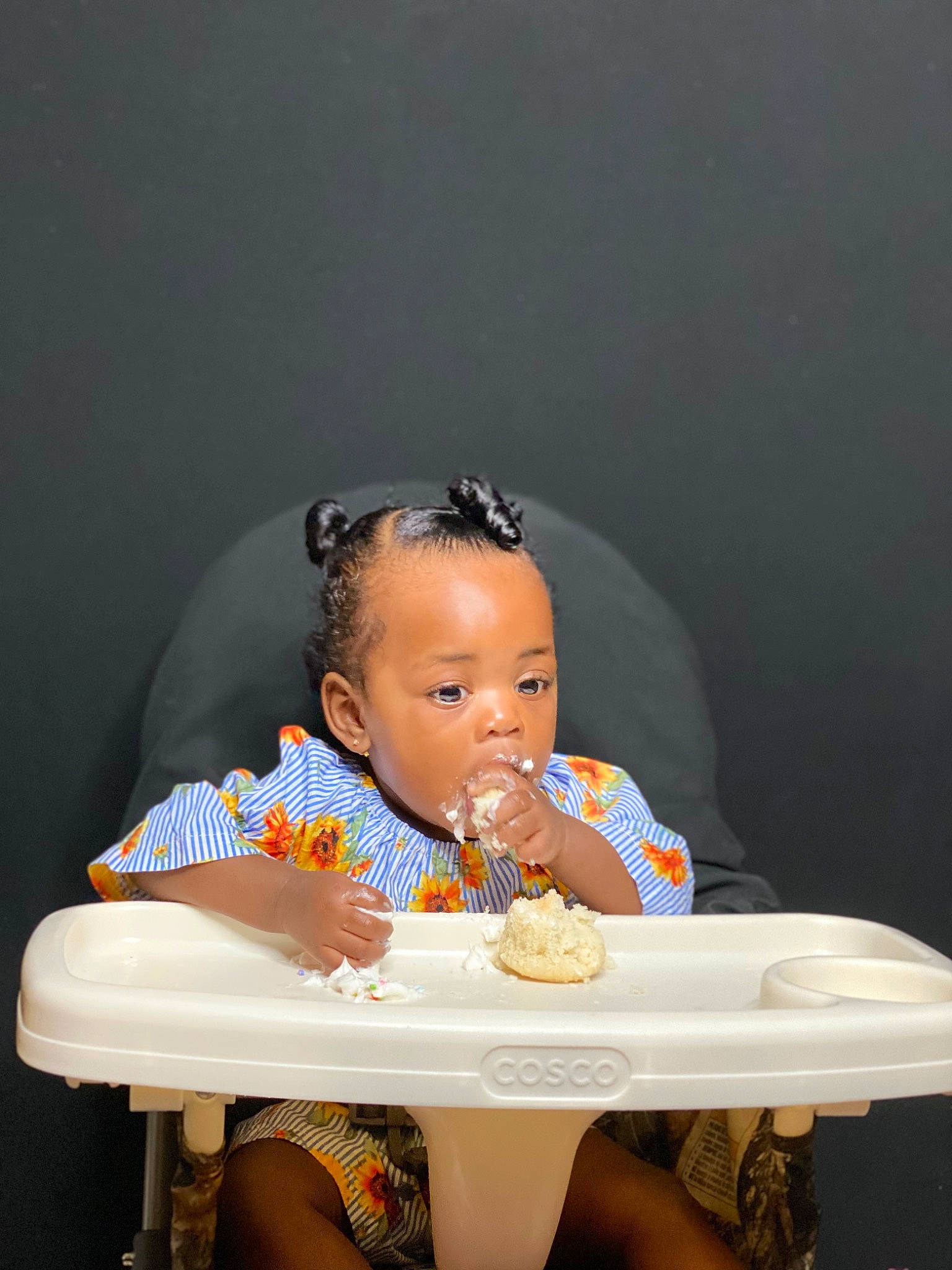 Dream is registered to the contest to win money with this photo: baby, baby_products, baby_toddler_clothing, chair, child, eating, flash_photography, food, fun, happy, leisure, person, play, portrait_photography, room, sharing, sitting, sweetness, table, toddler