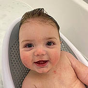 Hunter joined the competition — help win amazing prizes! baby, child, bathtub, bath, smiling, wet_hair, teeth, skin, happy, sitting, face, child_bath, water, baby_bath_seat, closeup, cute, infant, chubby_cheeks, indoors, personal_care
