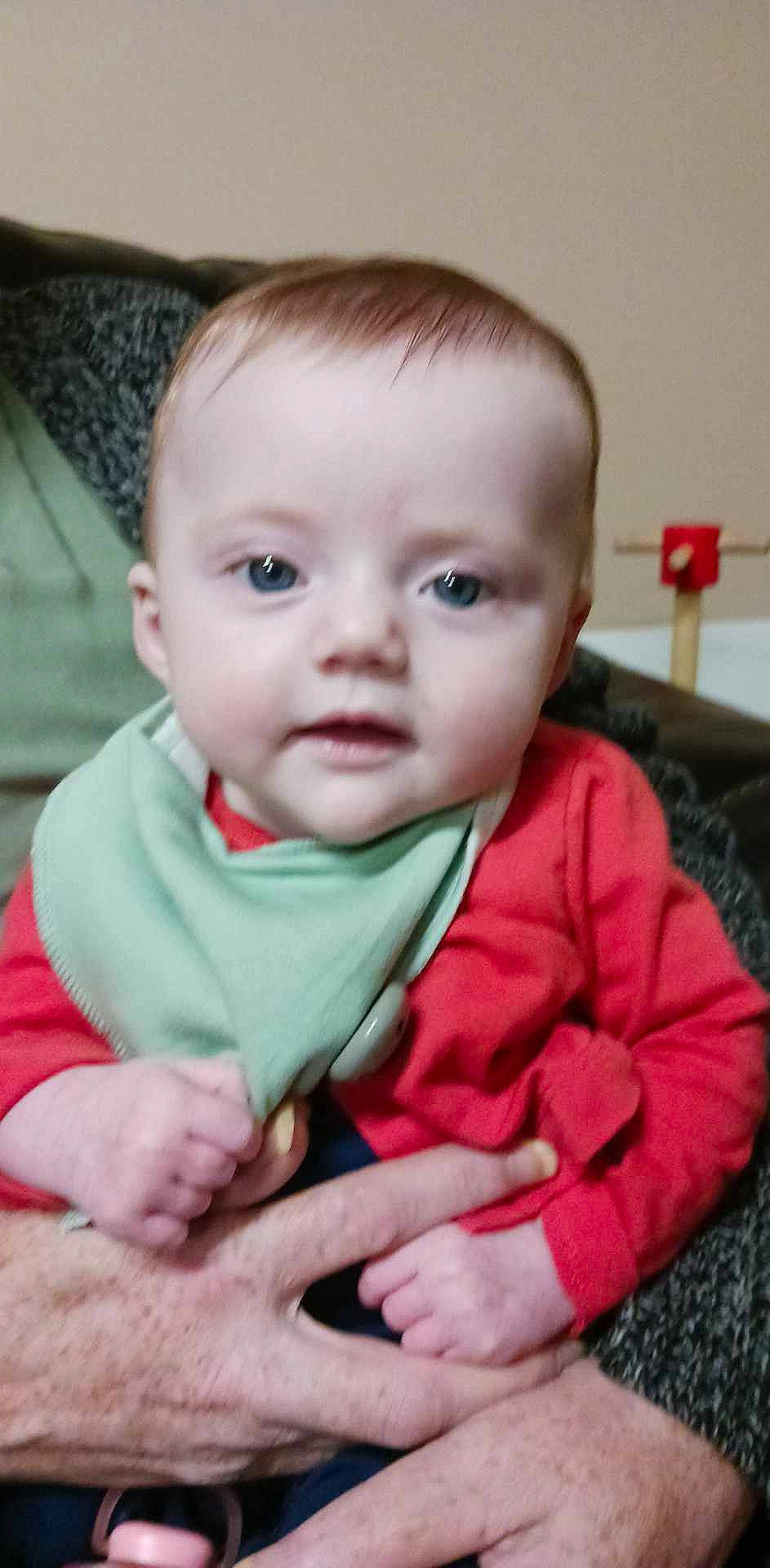 Blake is registered to the contest to win money with this photo: baby, baby_products, baby_toddler_clothing, cheek, child, comfort, eye, eyebrow, eyelash, flooring, hair, happy, head, iris, lip, nose, person, skin, sleeve, smile