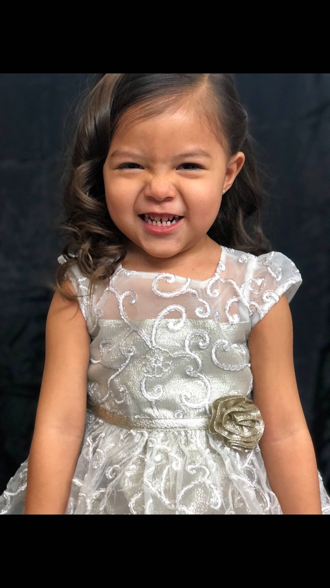 Tobie joined the competition — help win amazing prizes! arm, baby, beauty, bridal_clothing, bridal_party_dress, day_dress, dress, embellishment, fashion_design, flash_photography, formal_wear, gesture, gown, happy, joy, one_piece_garment, person, photograph, skin, sleeve