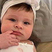 Kimarna is registered to the contest to win money with this photo: accessories, baby, biting, bonnet, clothing, face, happy, hat, head, headband, newborn, person, photography, portrait, smile