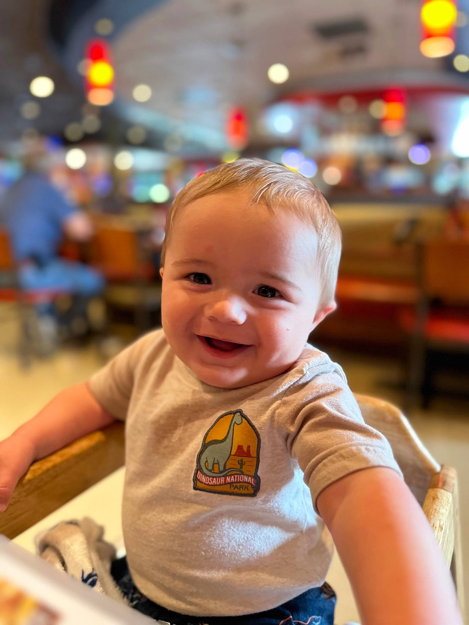 Elliot joined the competition — help win amazing prizes! baby, baby_toddler_clothing, chair, cheek, child, city, event, fun, hairstyle, happy, joy, leisure, light, person, recreation, sitting, skin, smile, snapshot, summer