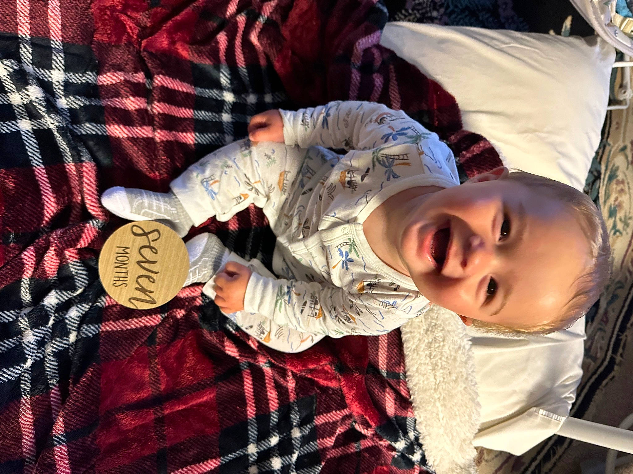 Elliot joined the competition — help win amazing prizes! baby, child, comfort, cool, fun, happy, joy, leaf, linens, pattern, person, plaid, red, room, sitting, smile, t_shirt, tartan, textile, toddler
